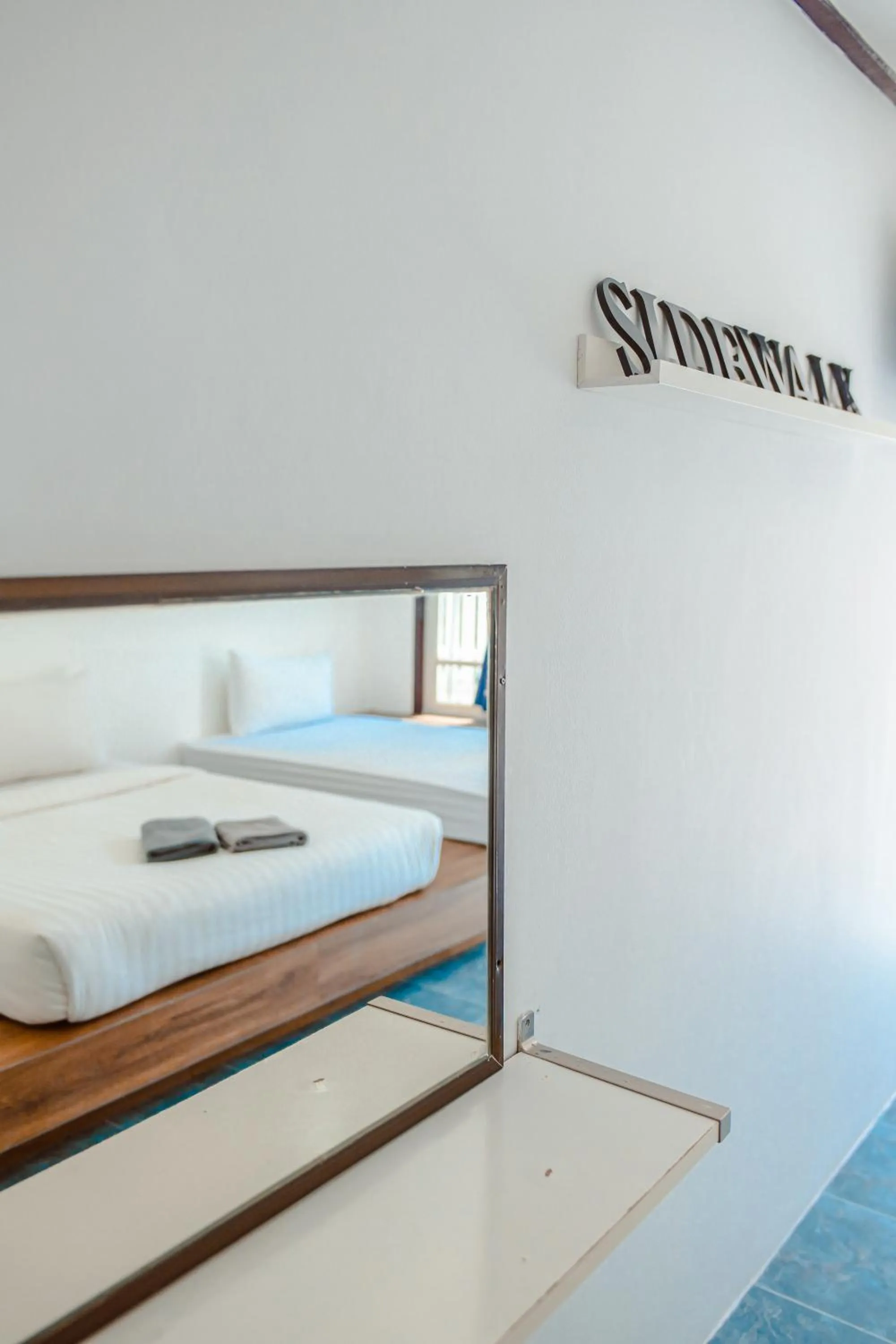 Bed in Sidewalk Boutique Hotel