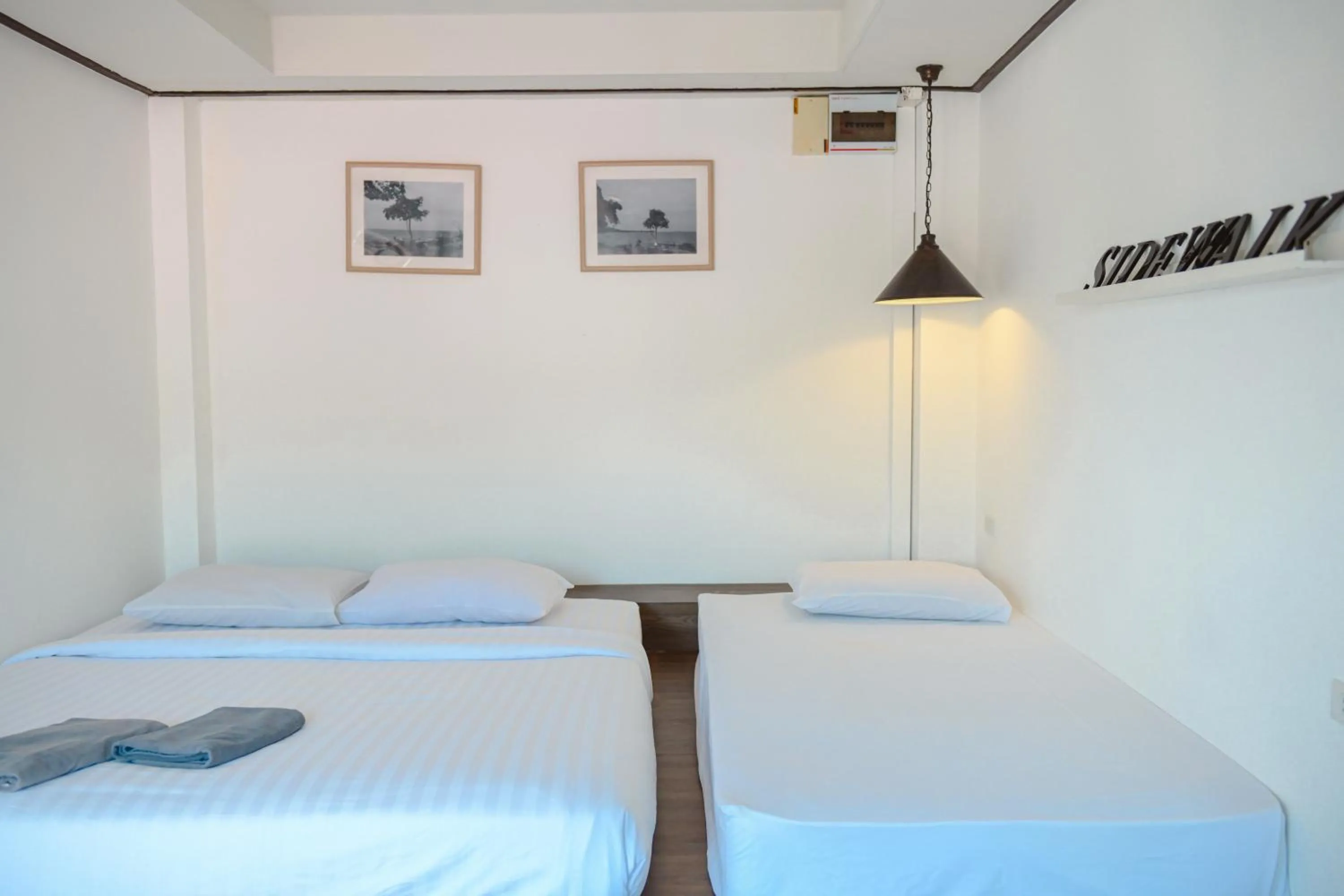 Bed in Sidewalk Boutique Hotel