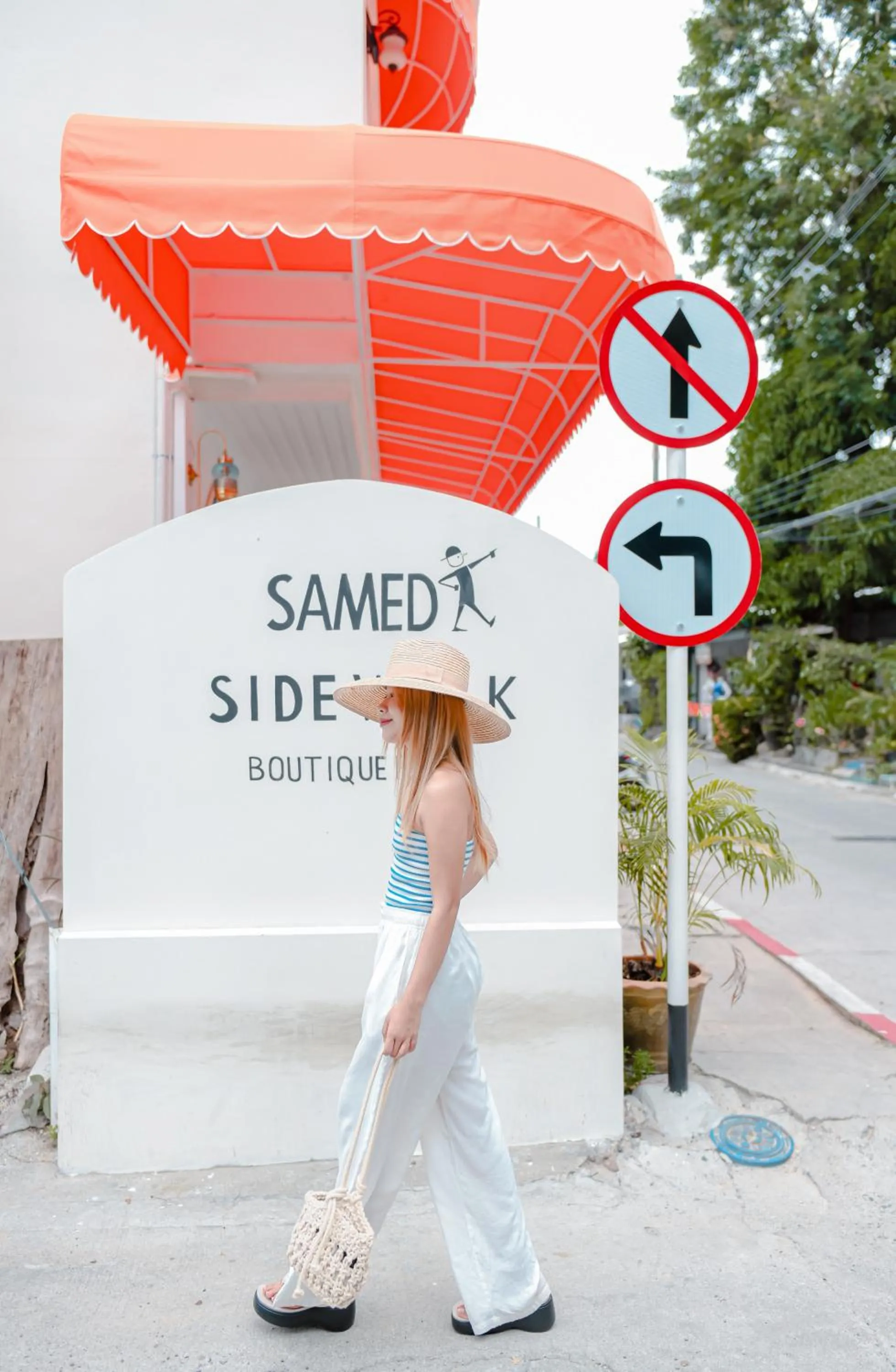 Property logo or sign in Sidewalk Boutique Hotel