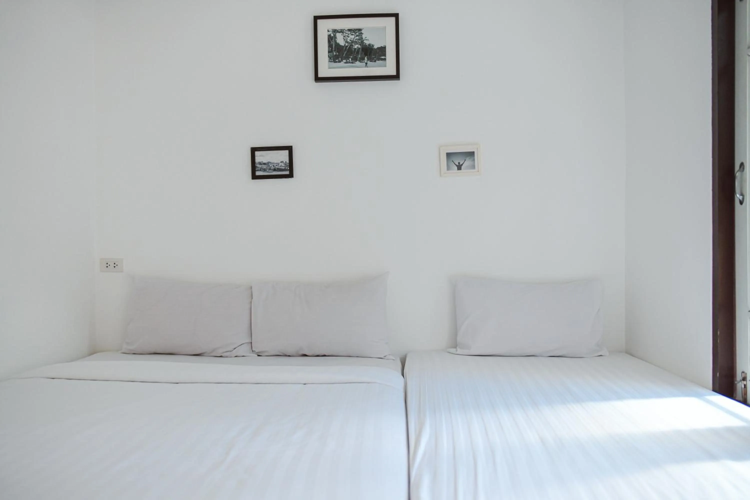 Bed in Sidewalk Boutique Hotel