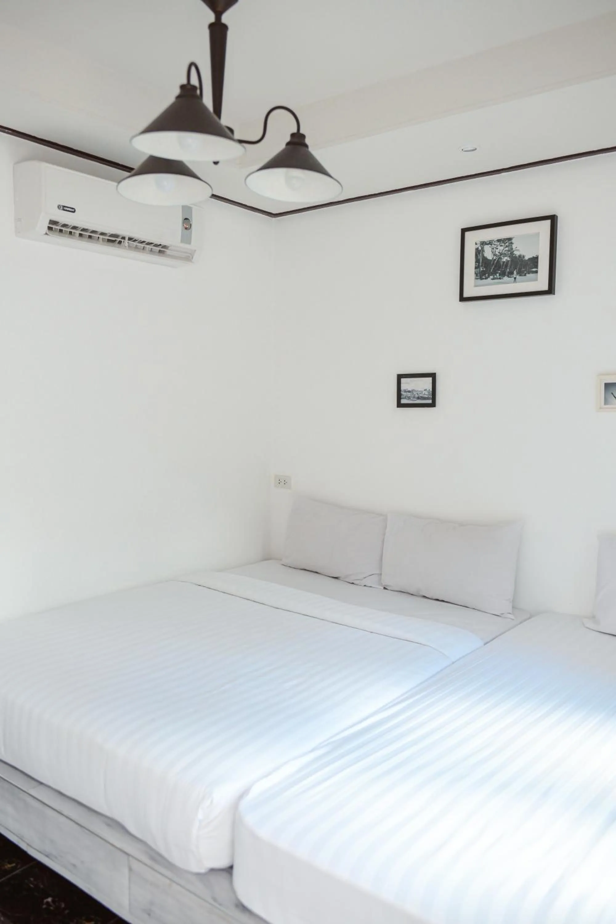 Bed in Sidewalk Boutique Hotel