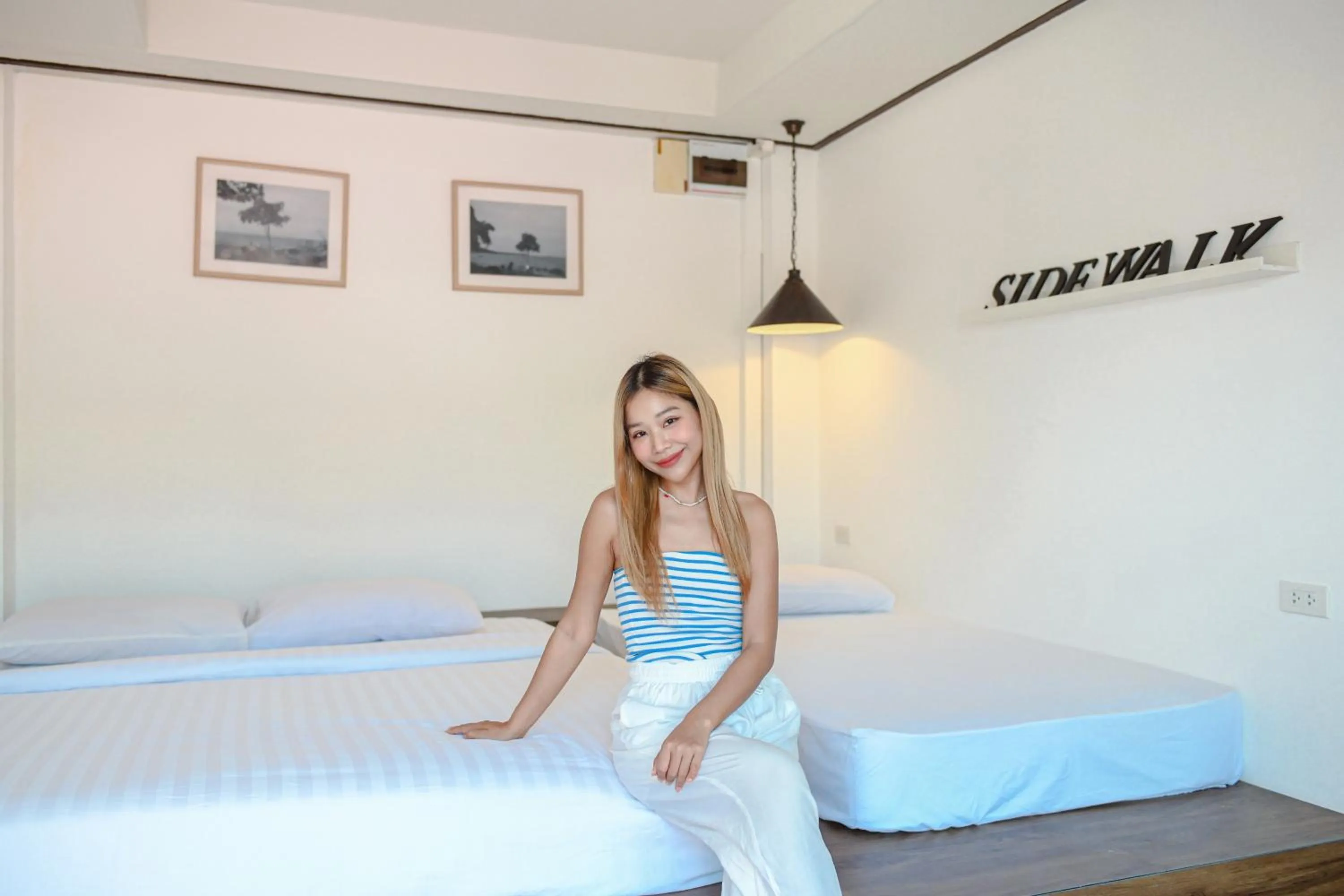 Bed in Sidewalk Boutique Hotel