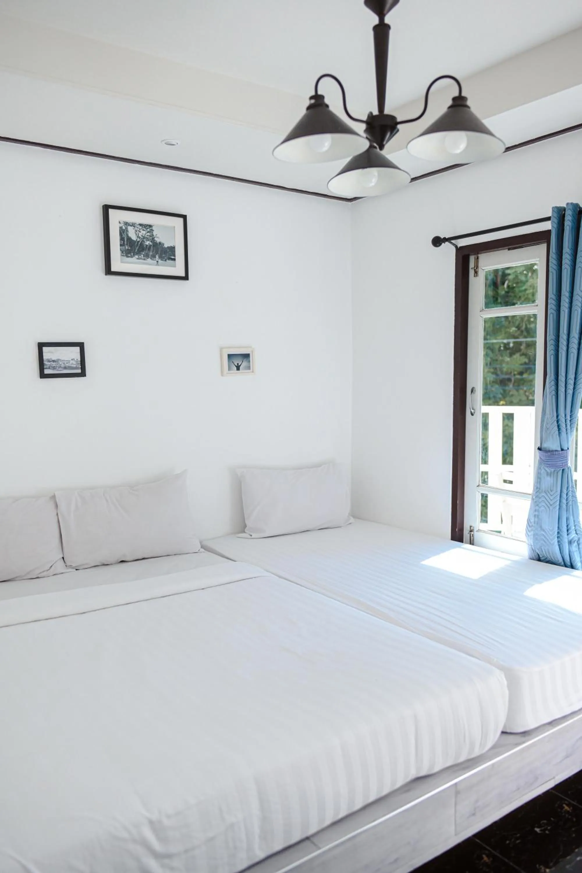 Bed in Sidewalk Boutique Hotel