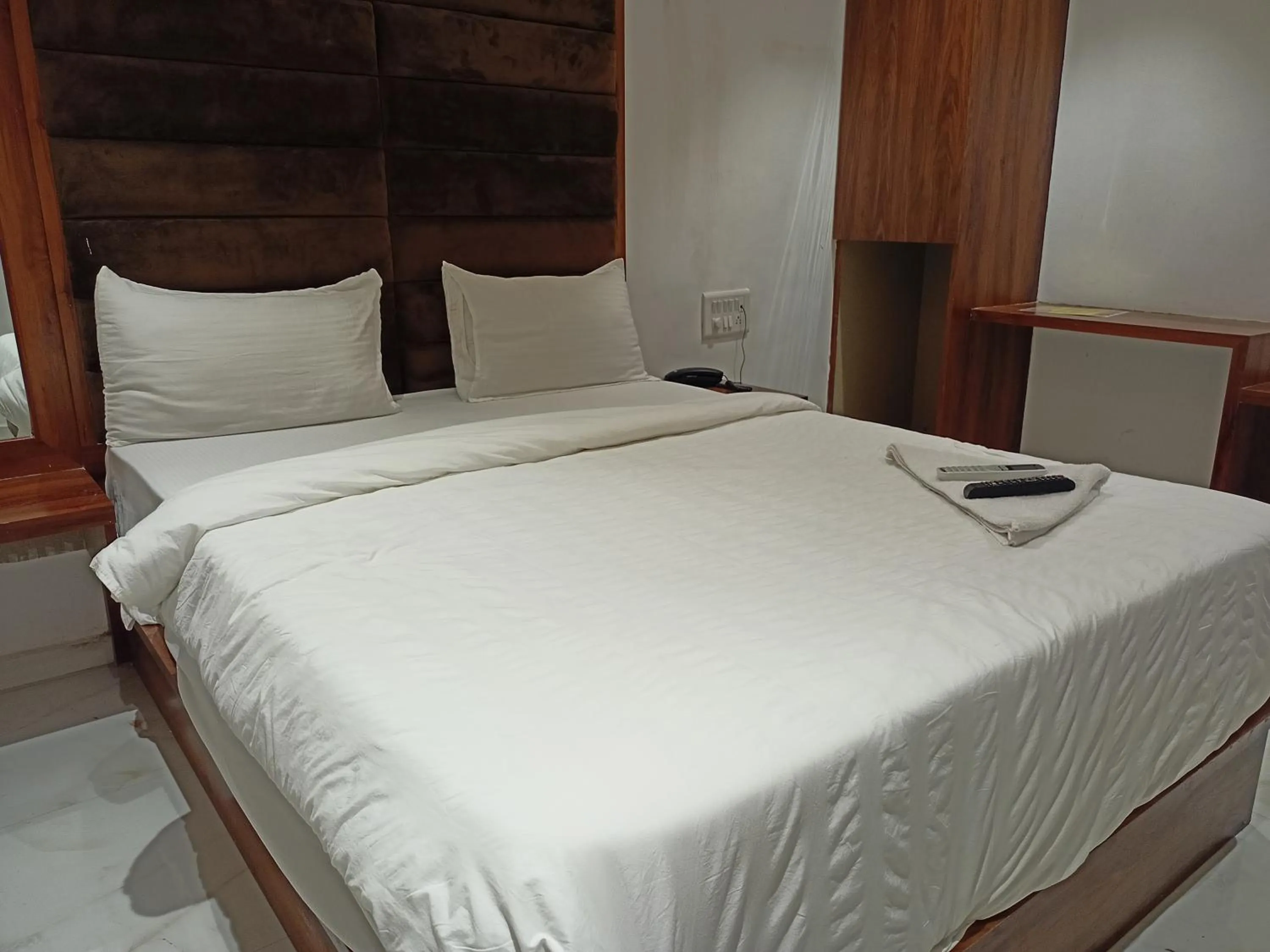 Bedroom, Bed in Hotel Palms Residency, Chembur Mumbai