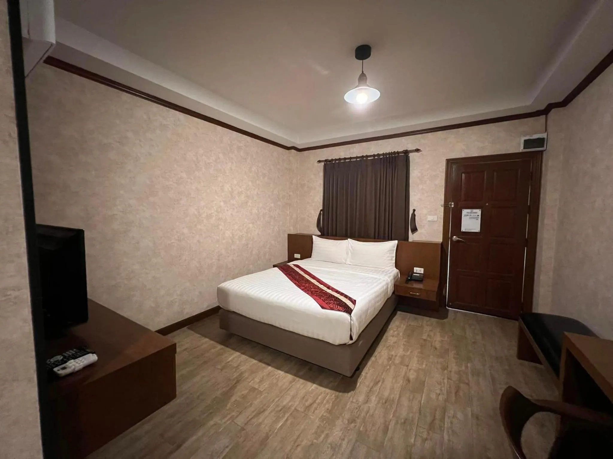 Bed in RoomQuest Chonburi Laem Chabang