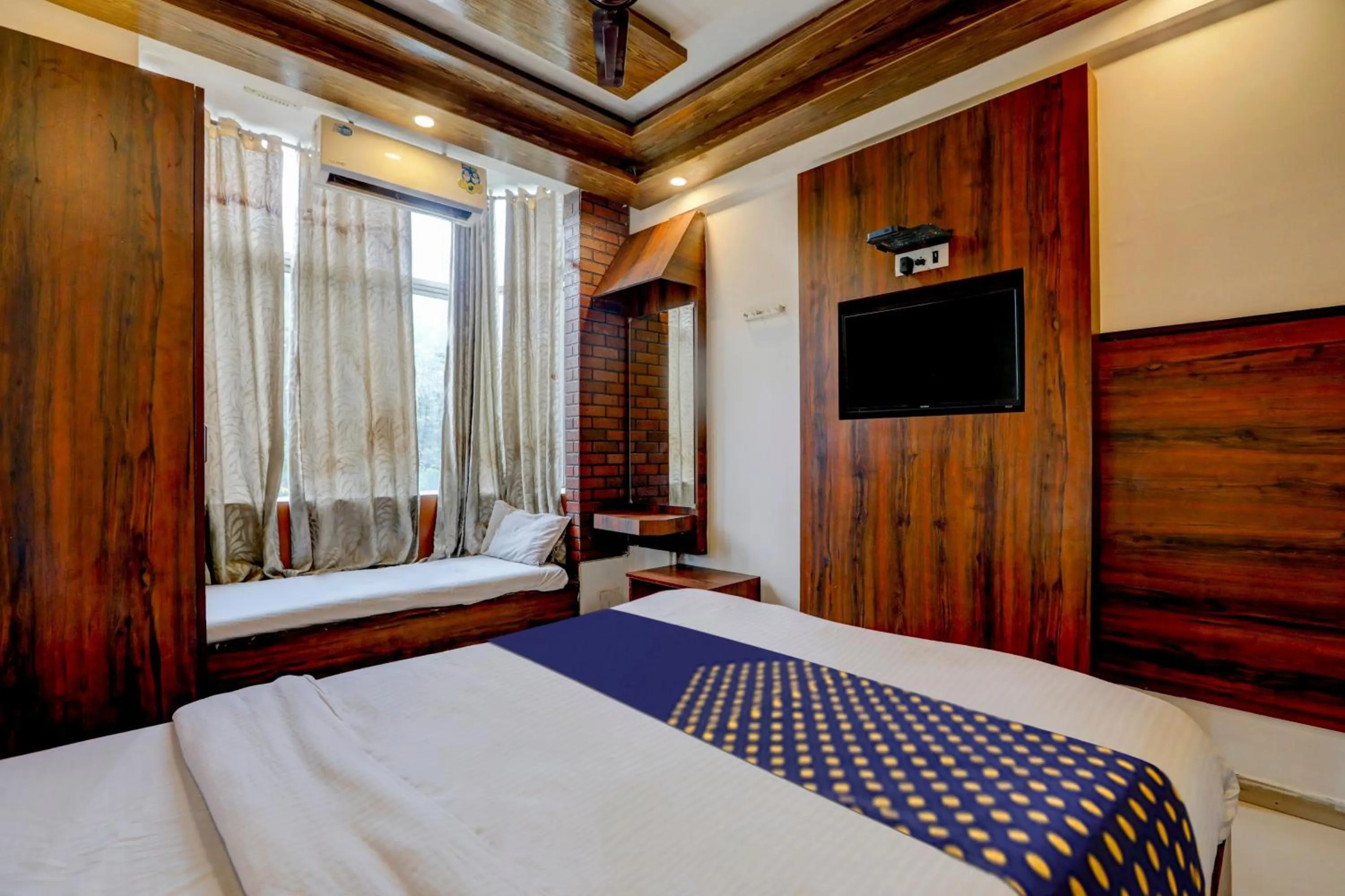 Bedroom in Hotel O Rajdhani Group Of Hotels