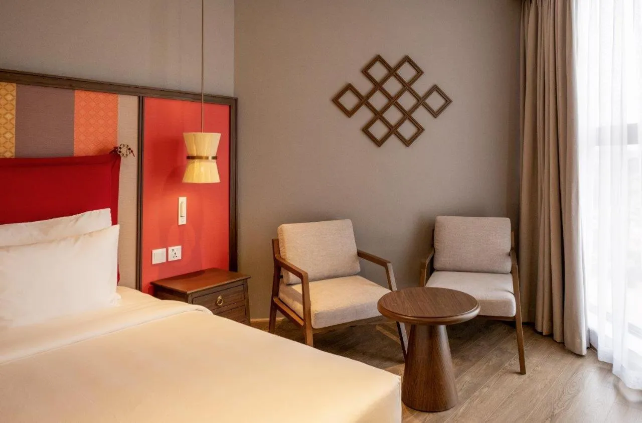 Photo of the whole room, Bed in M Continental by Mandala Mui Ne