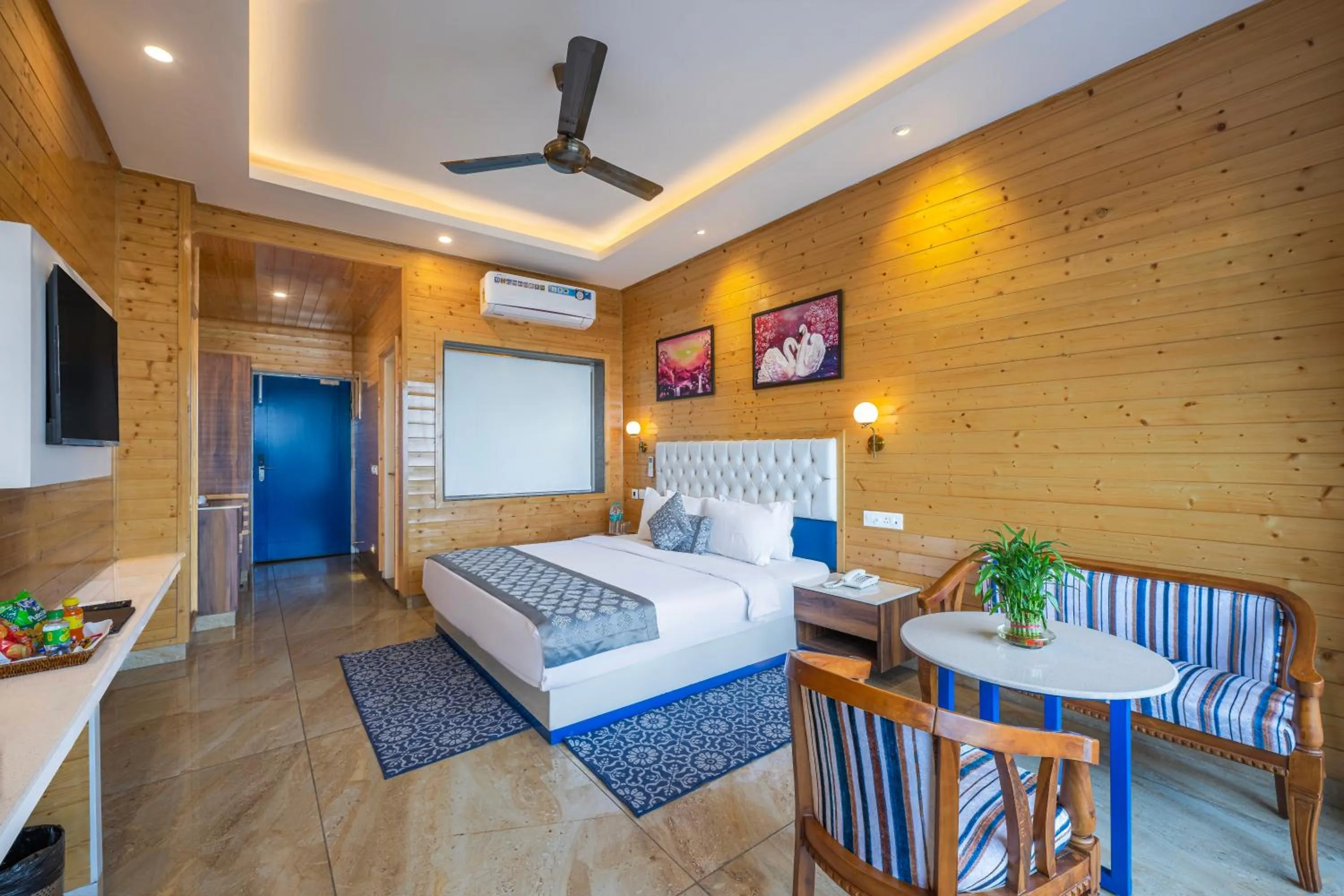 Living room, Bed in Hotel Wood Stock Luxury - A Boutique Property - Penthouse - Open Air Restaurant & Terrace