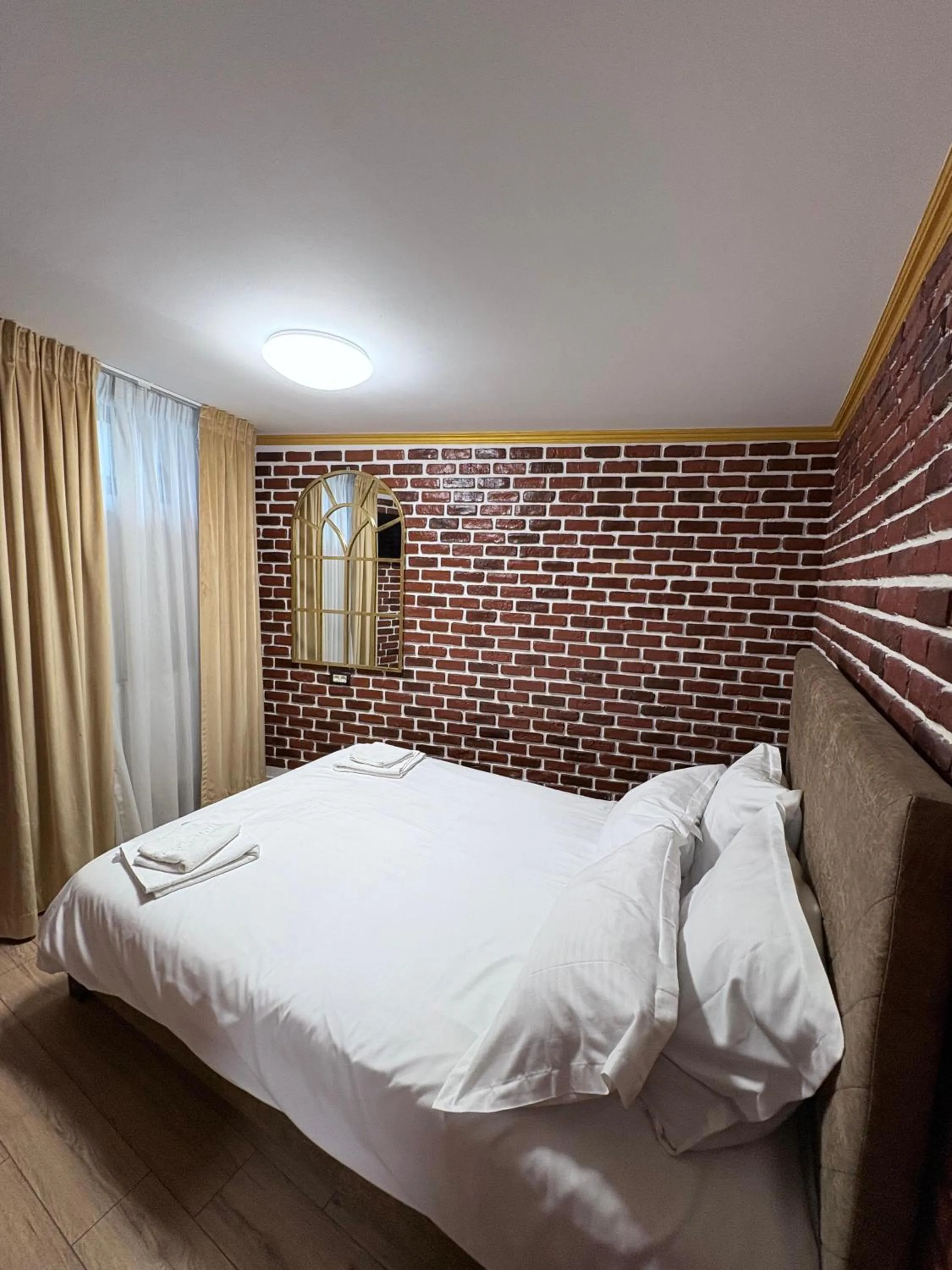 Bed in Hotel Artegianale Boutique