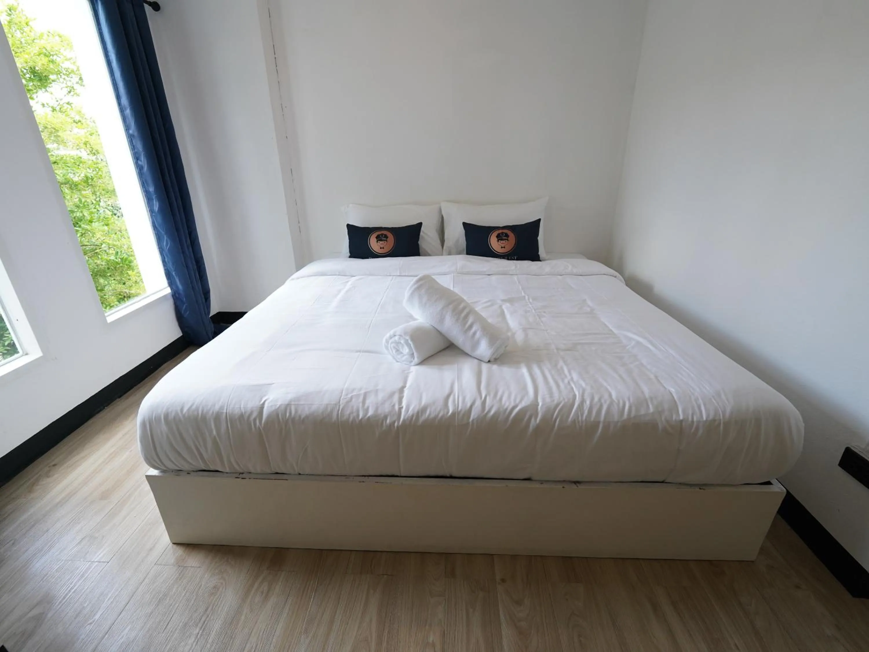 Bed in RoomQuest IT Square Don Mueang Airport