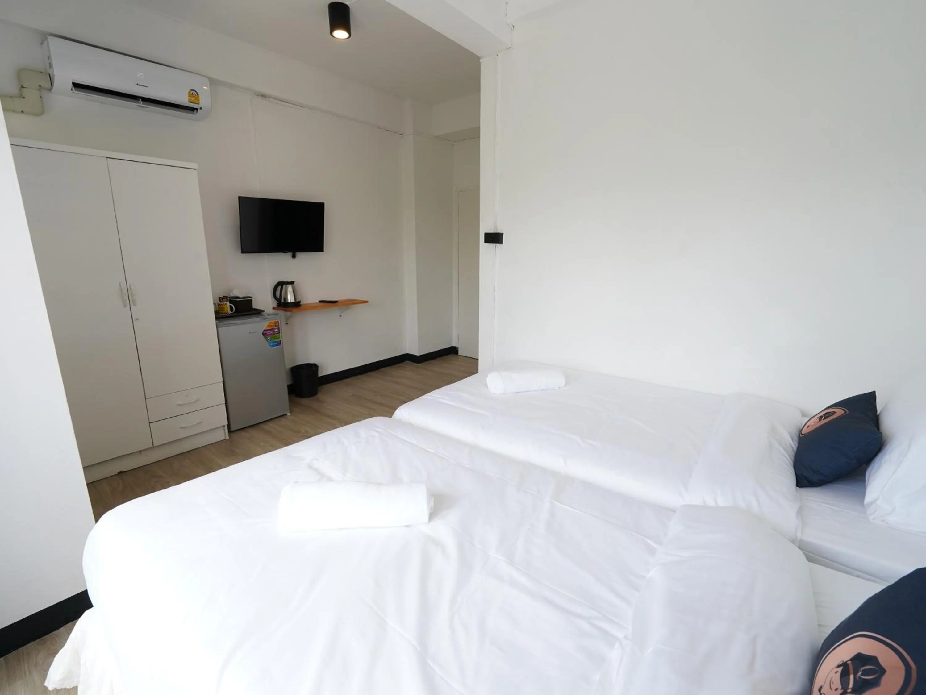Bed in RoomQuest IT Square Don Mueang Airport