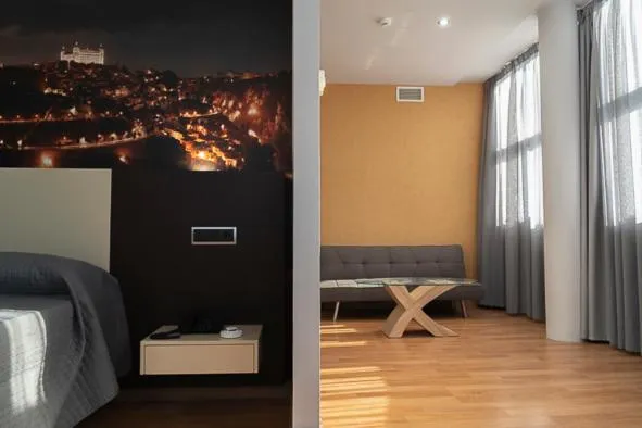 Communal lounge/ TV room, Bed in Hotel-Asador Montes Oretanos