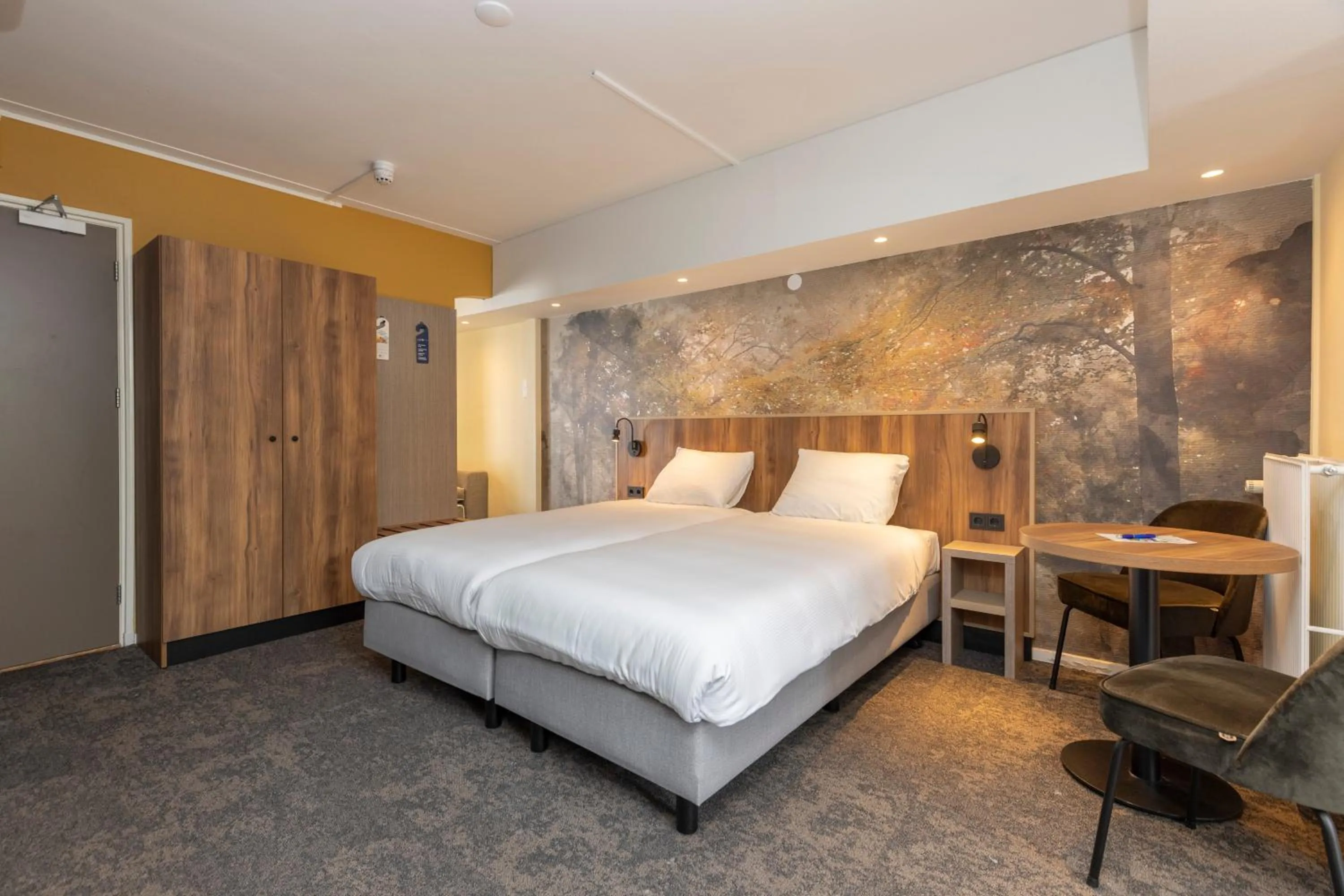 Bed in Fletcher Hotel Restaurant Erica