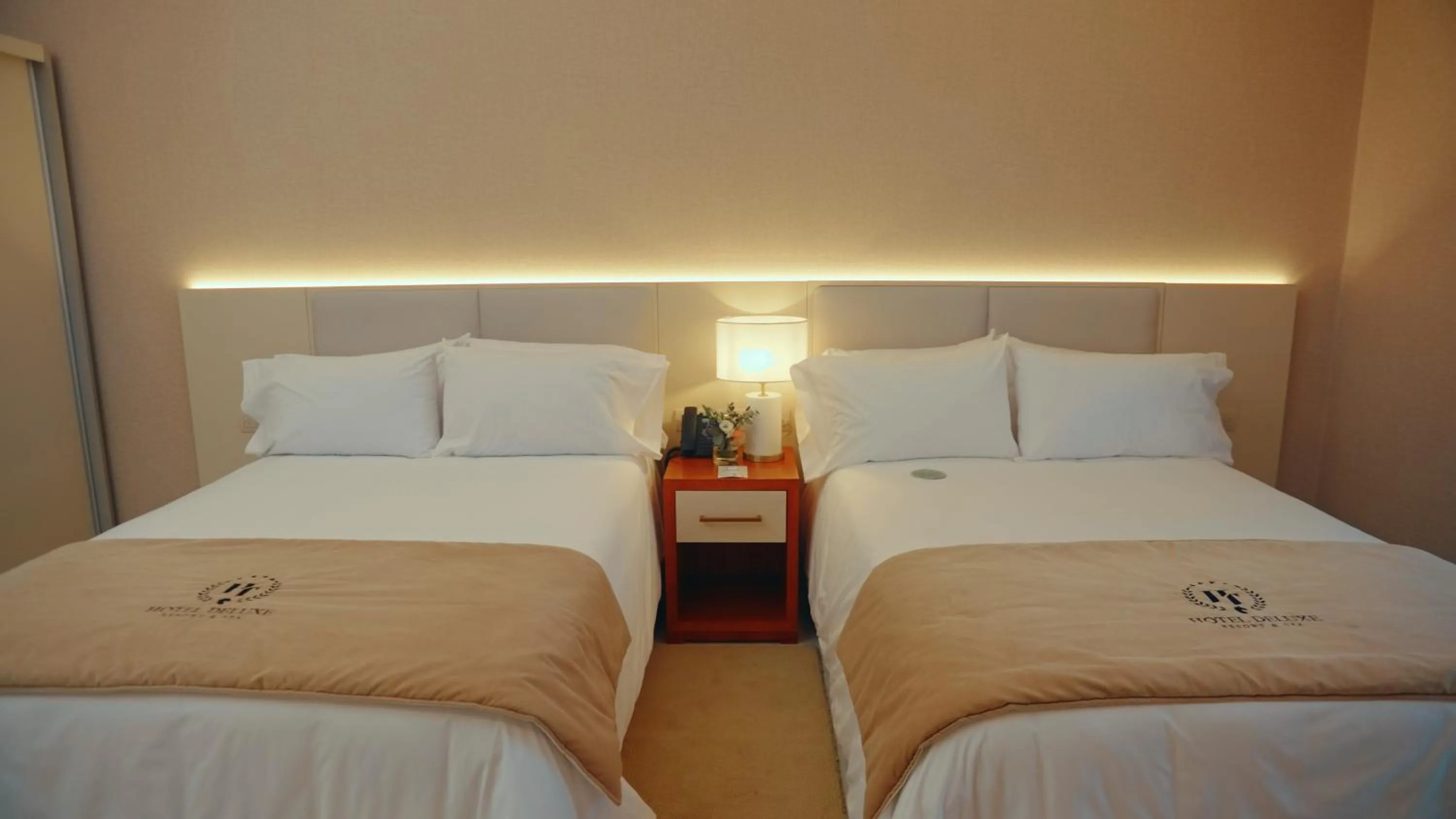 Bedroom in HT Hotel Deluxe Resort & SPA