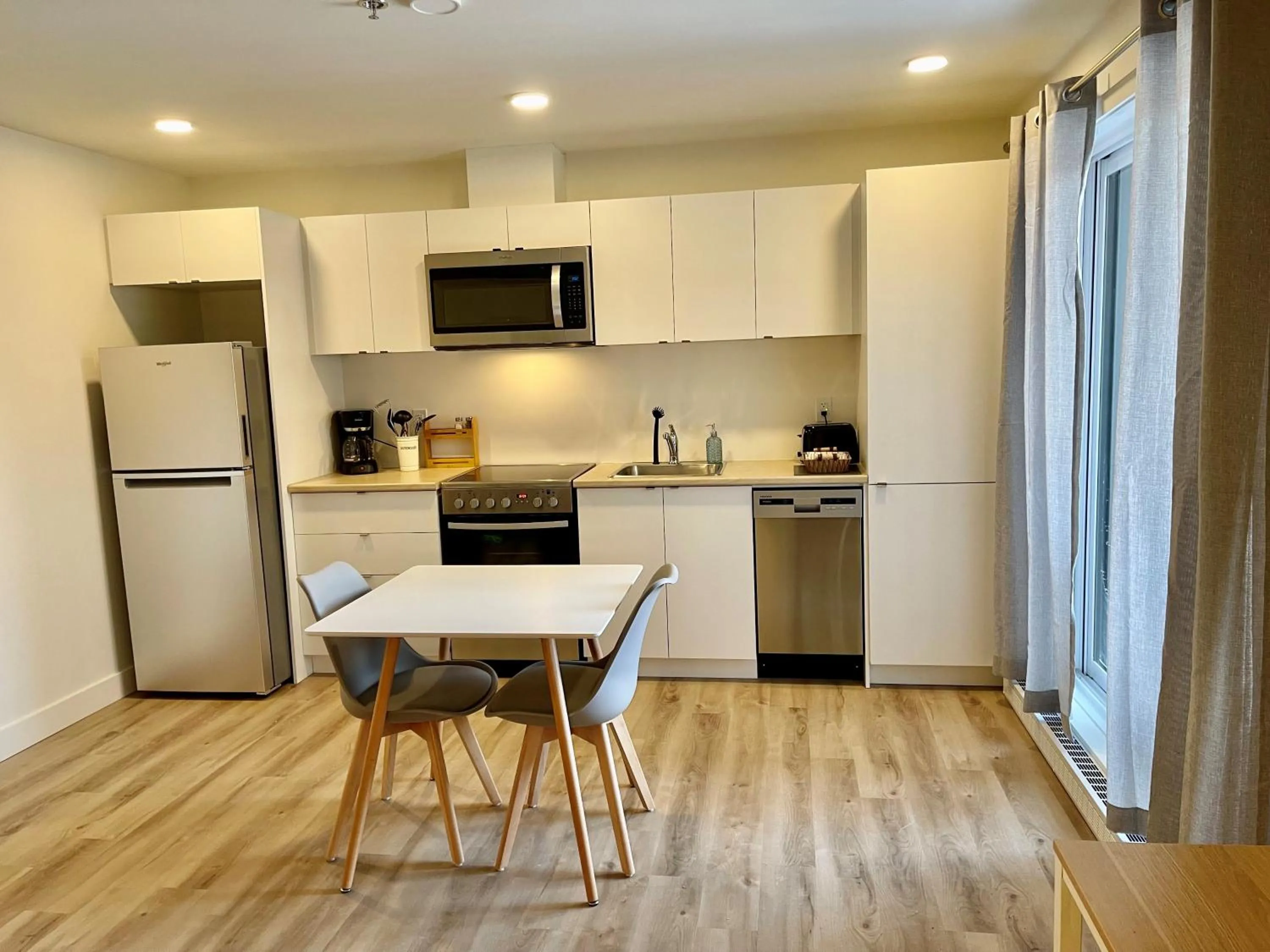 Kitchen or kitchenette in APPART-HOTEL L'UNI