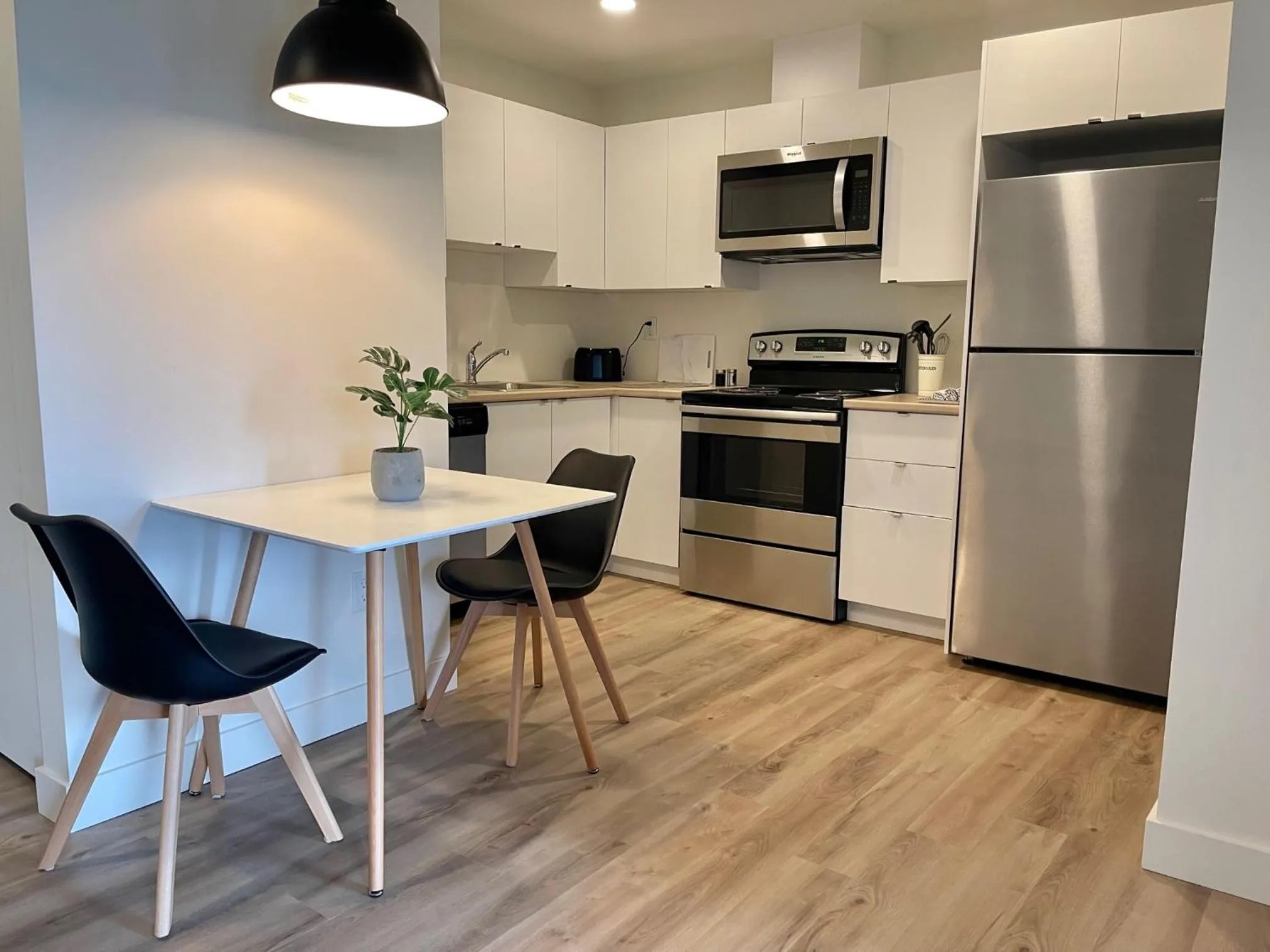 Kitchen or kitchenette in APPART-HOTEL L'UNI