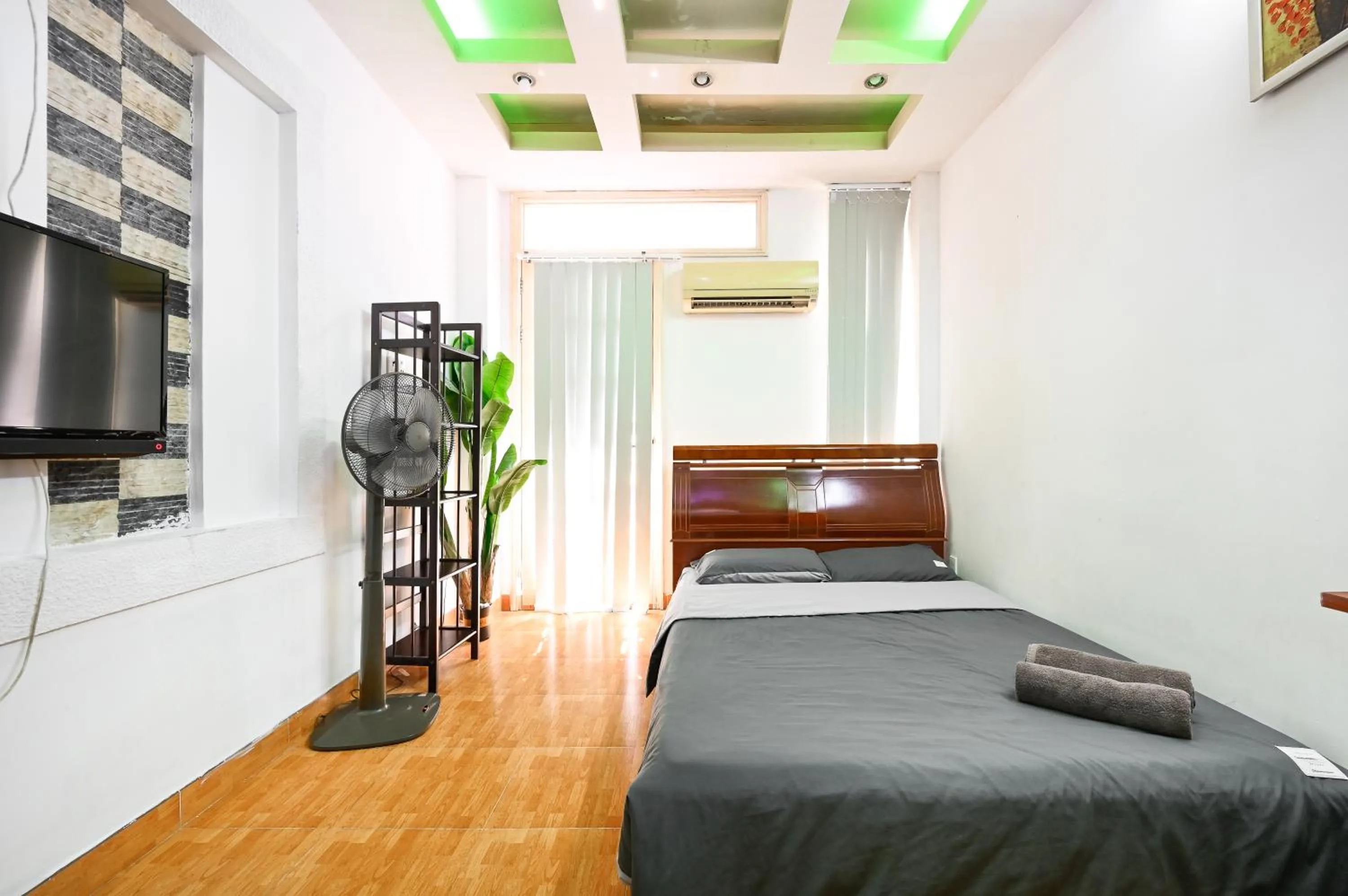 Bed in Ohio Hotel & Apartment