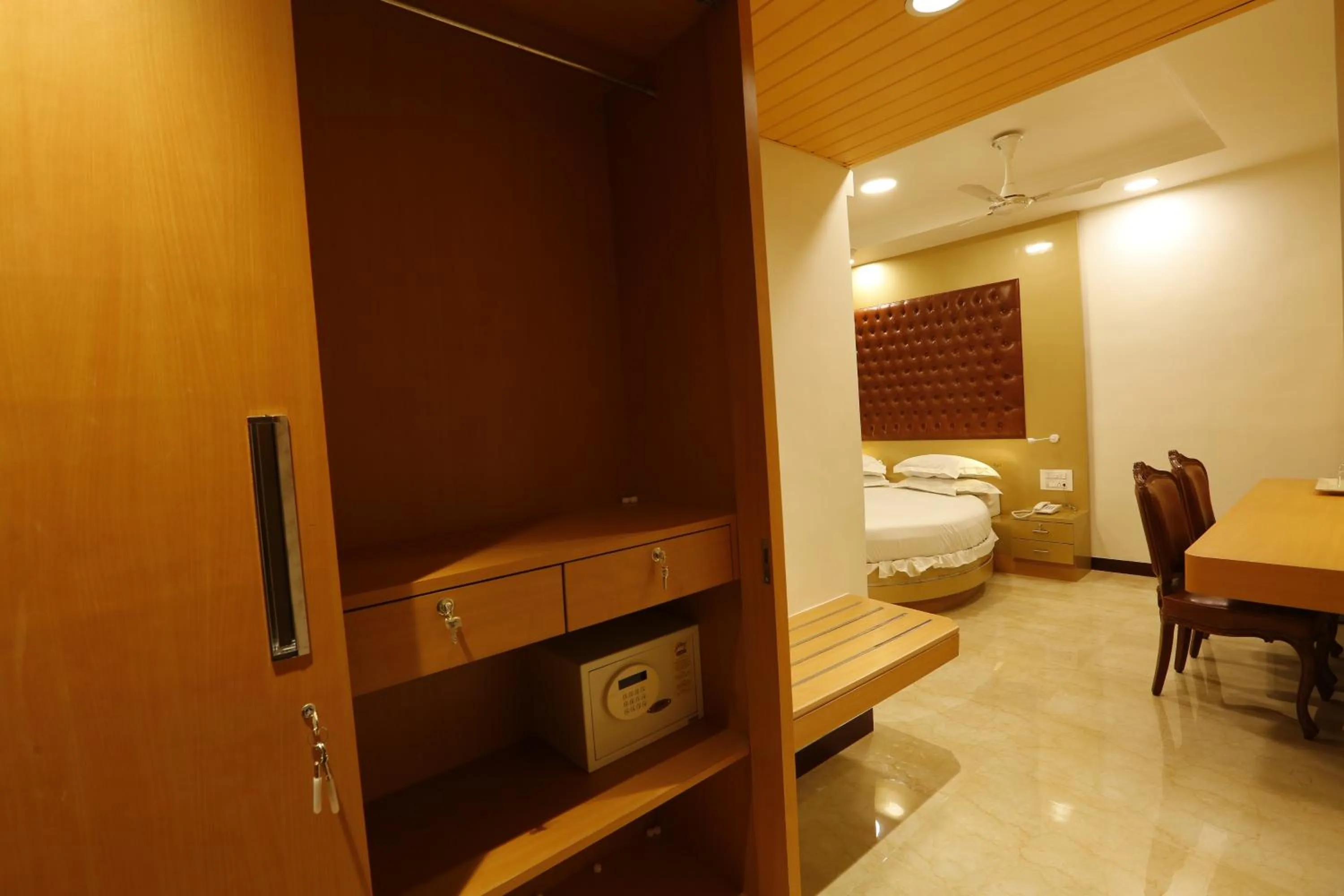 Bed in Hotel Ravikiran Alibaug