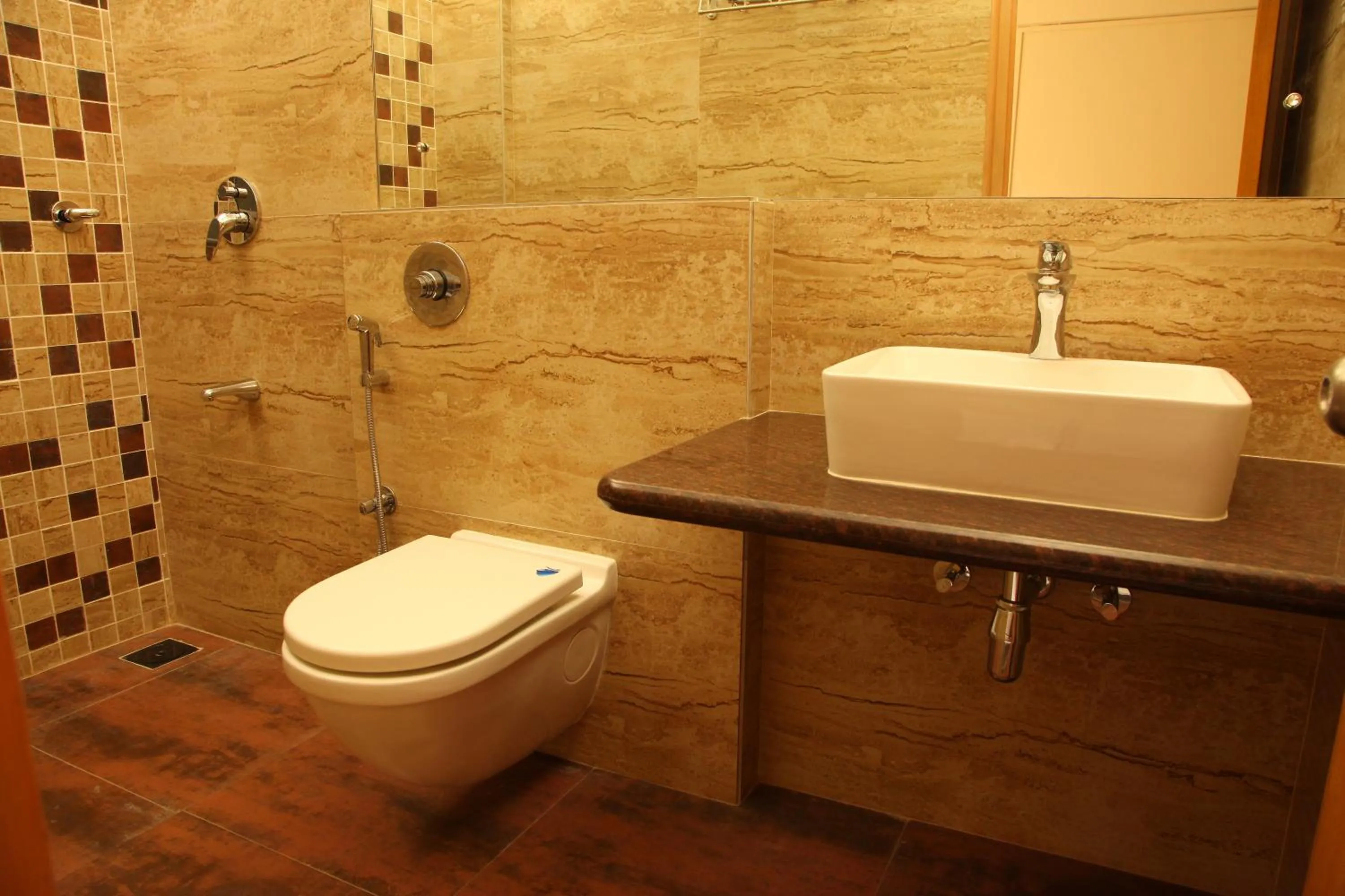 Bathroom in Hotel Ravikiran Alibaug