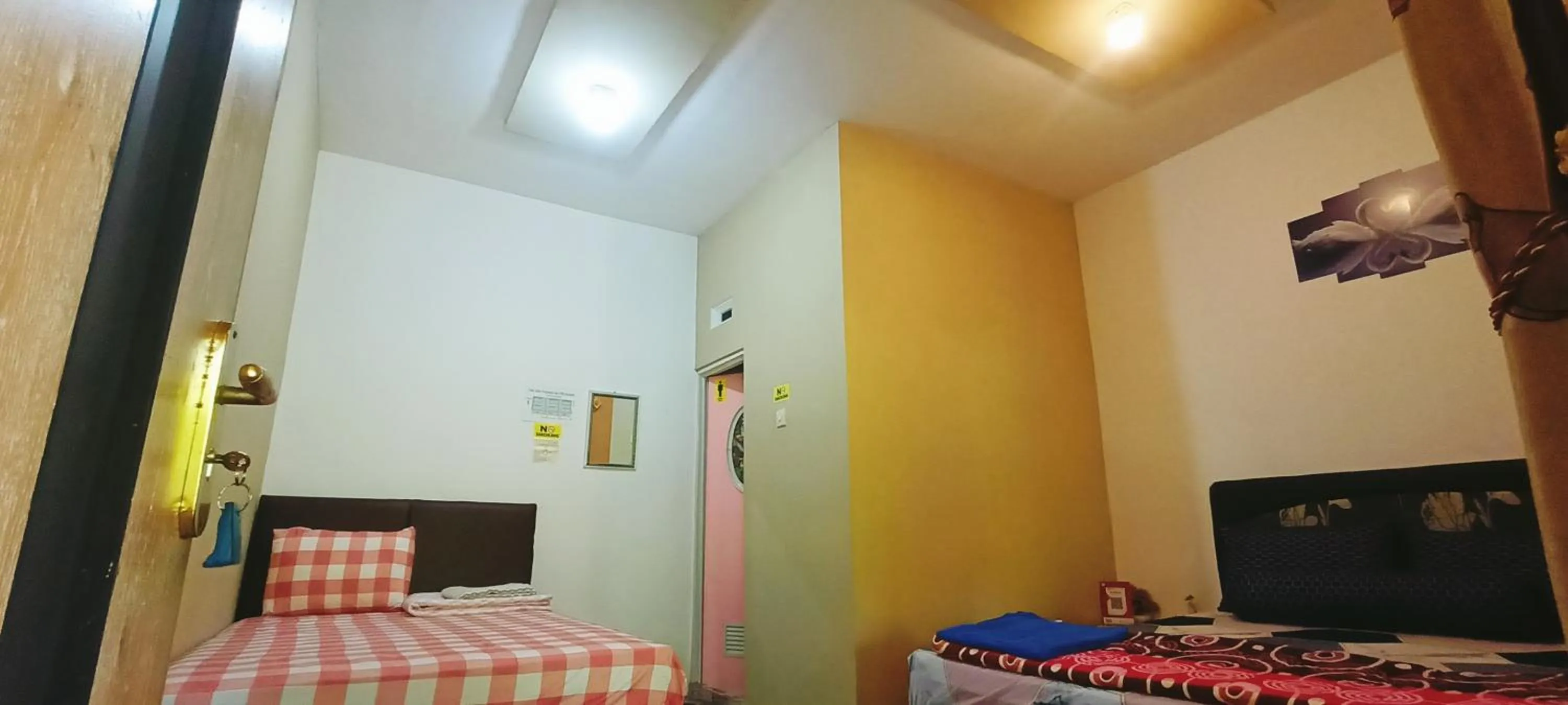Bed in FAREL HOMESTAY KAWAHIJEN