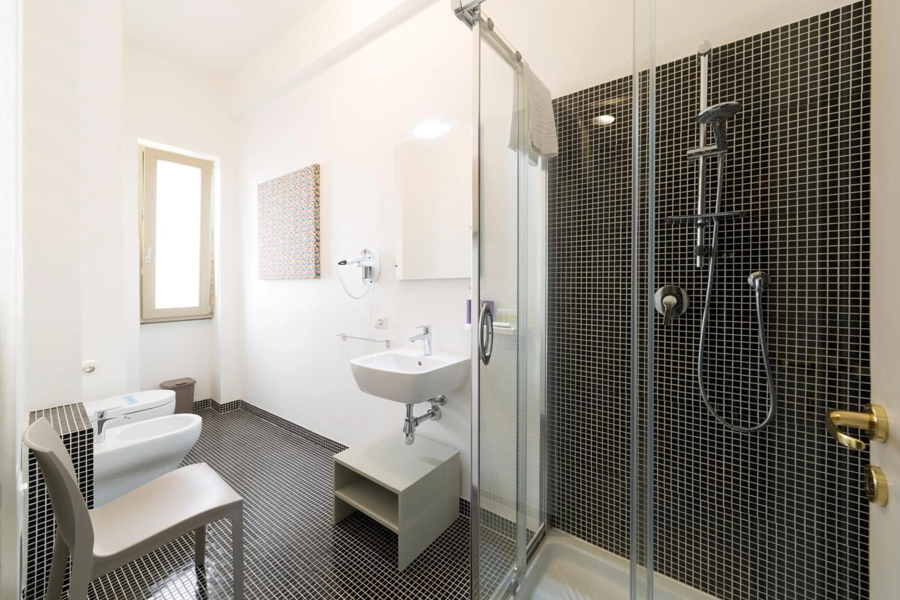 Shower in GUEST HOUSE SONNINO 37 Cagliari