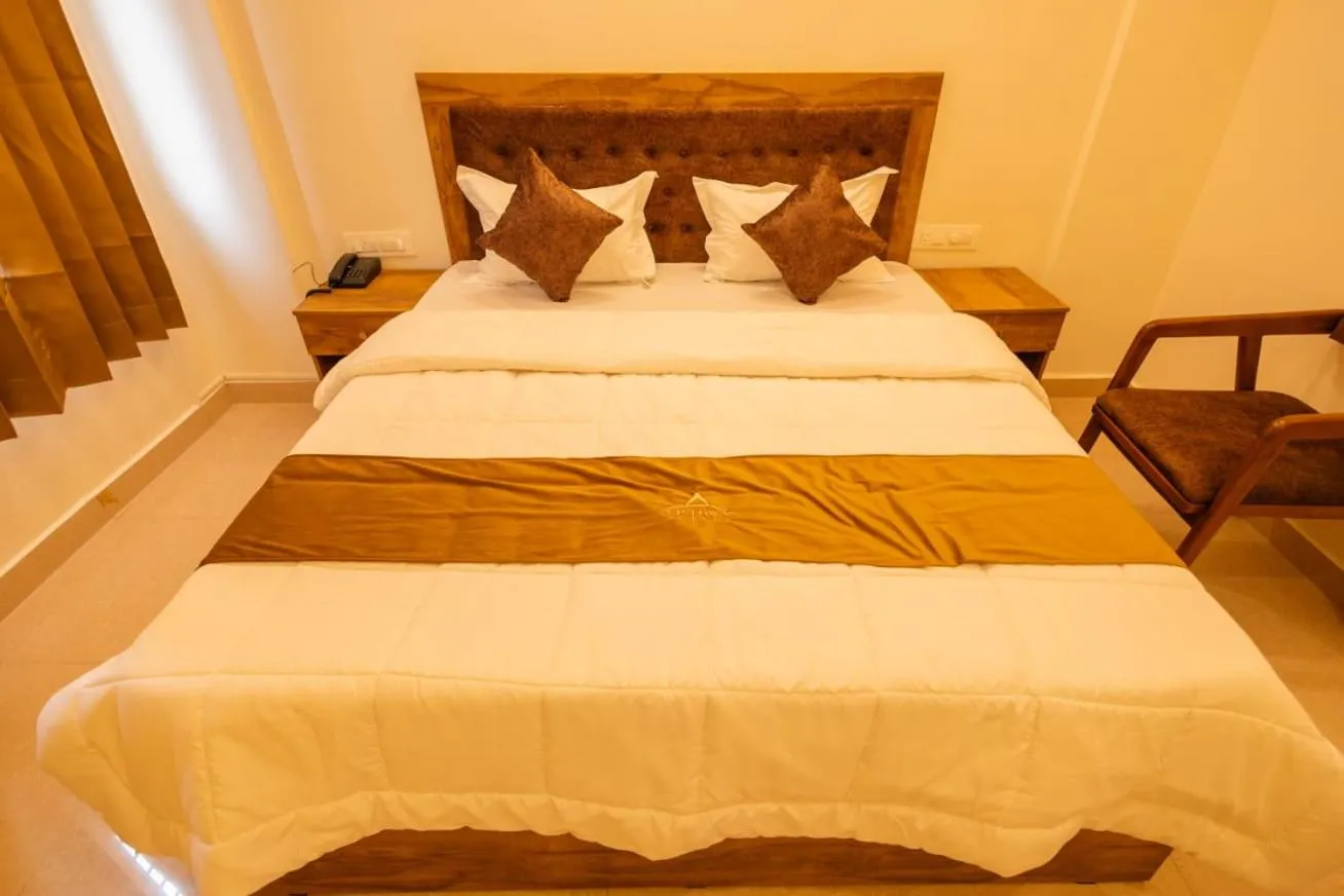 Bed in Uptown Suites