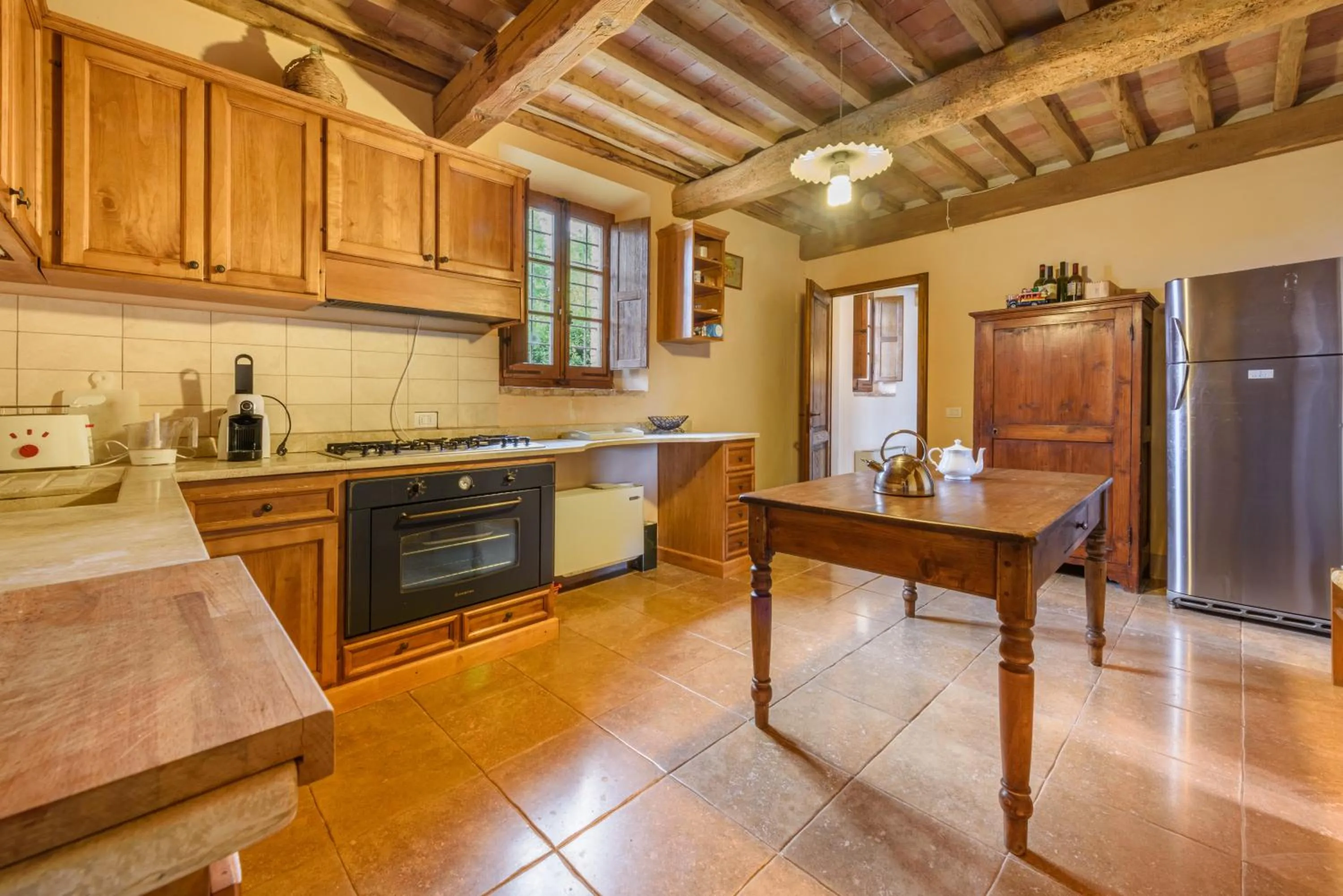 Kitchen or kitchenette in Villa Boschetto by Mmega