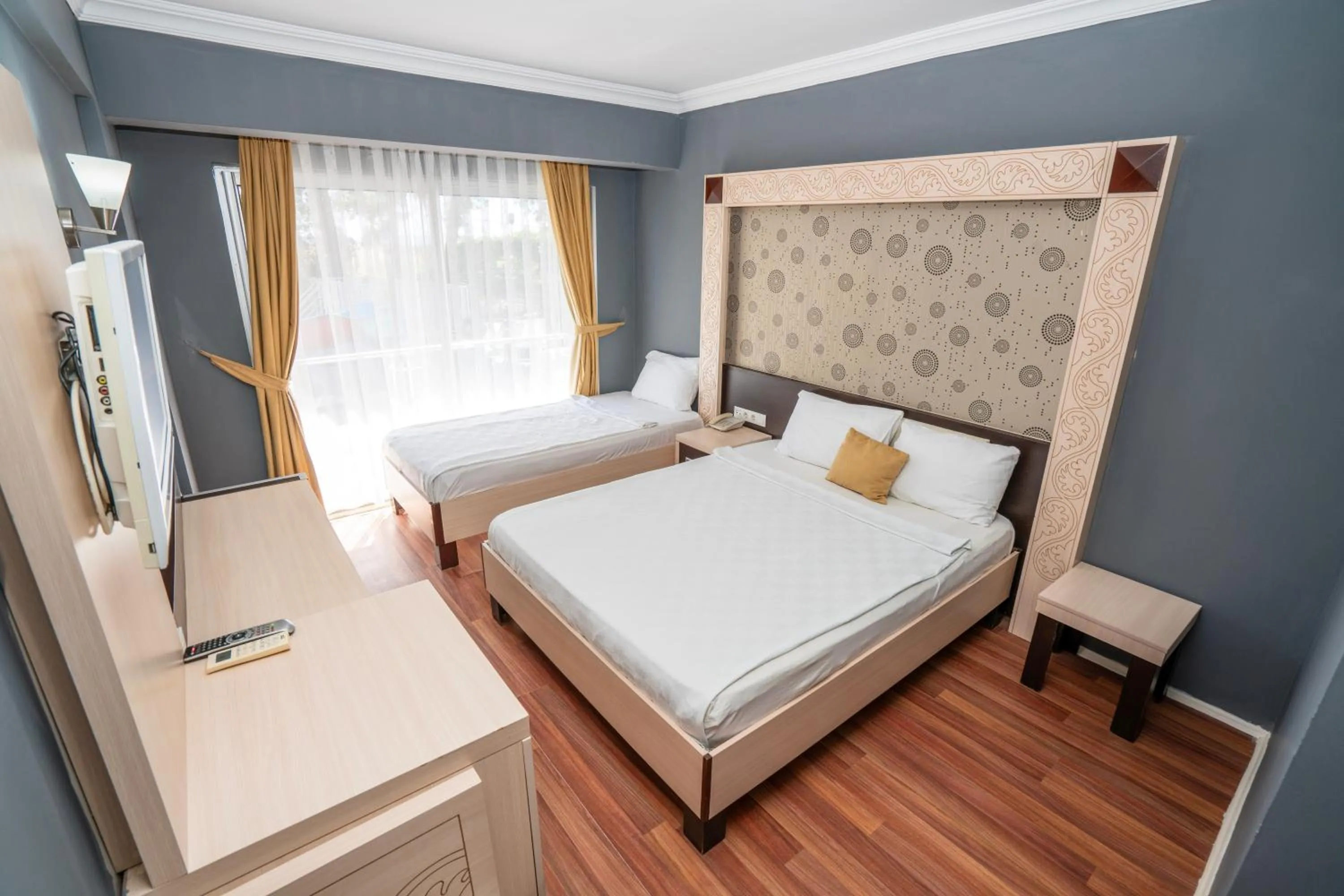 Bed in Aperion Beach Hotel Side