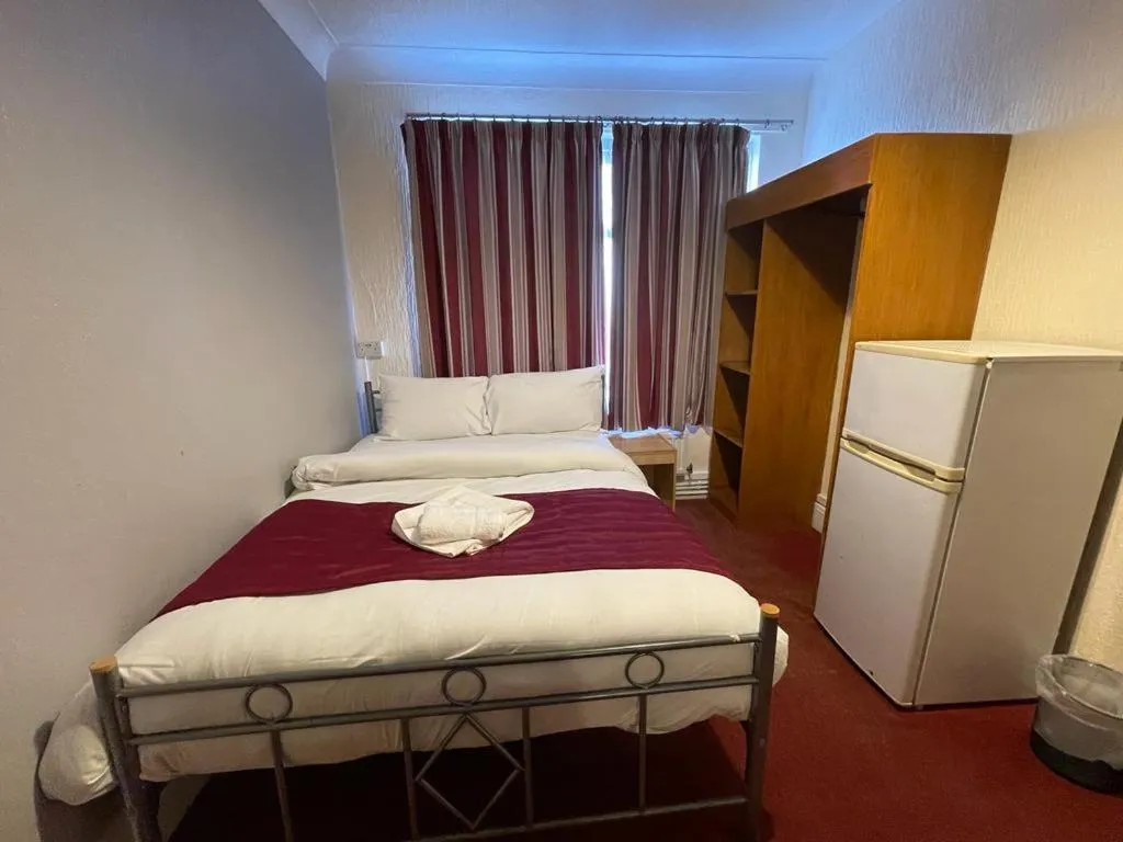 Bed in ST NICHOLAS HOTEL