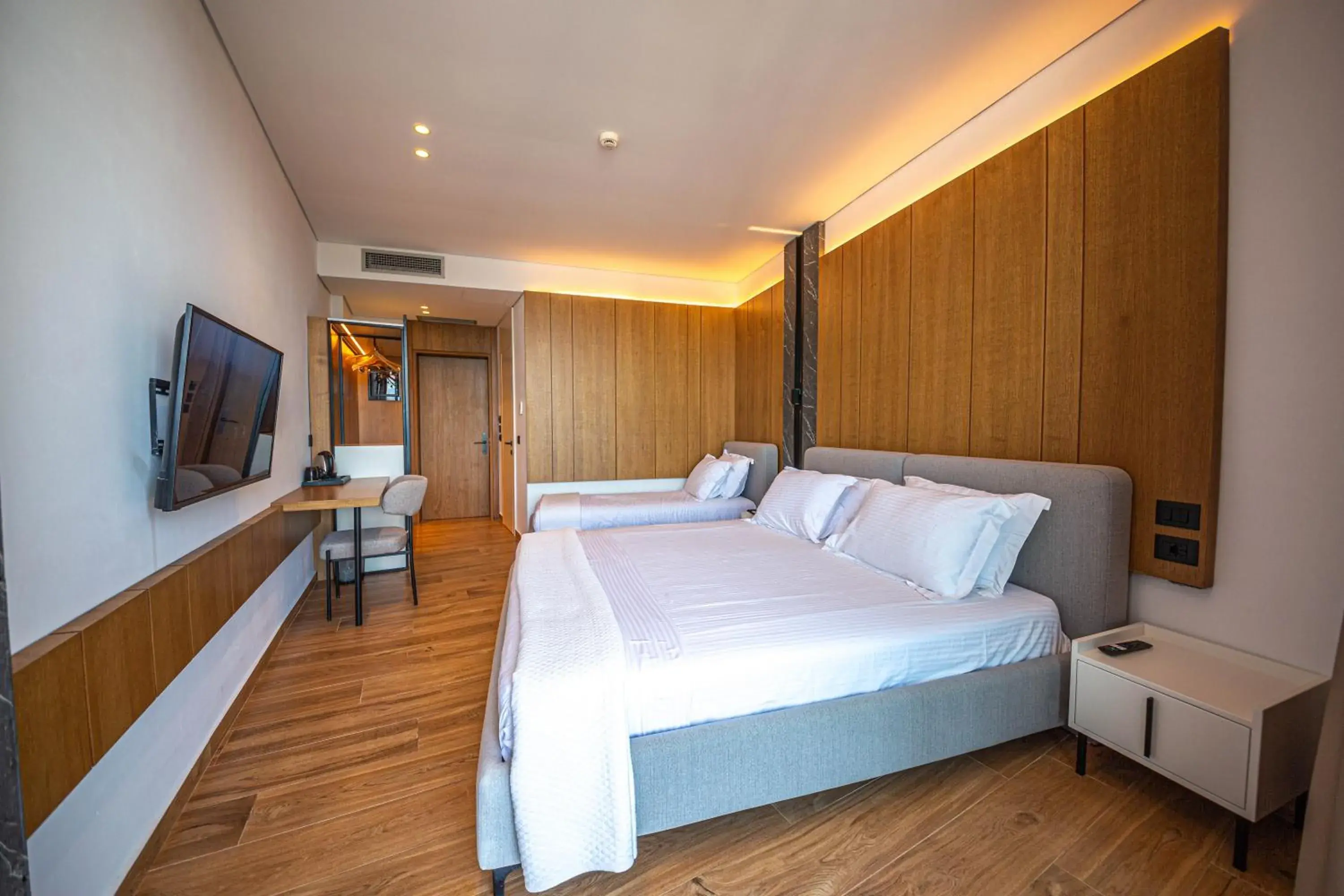 Deluxe Triple Room - Ground Floor in Nobbu Hotel Ksamil Deluxe Triple Room - Ground Floor in Nobbu Hotel Ksamil