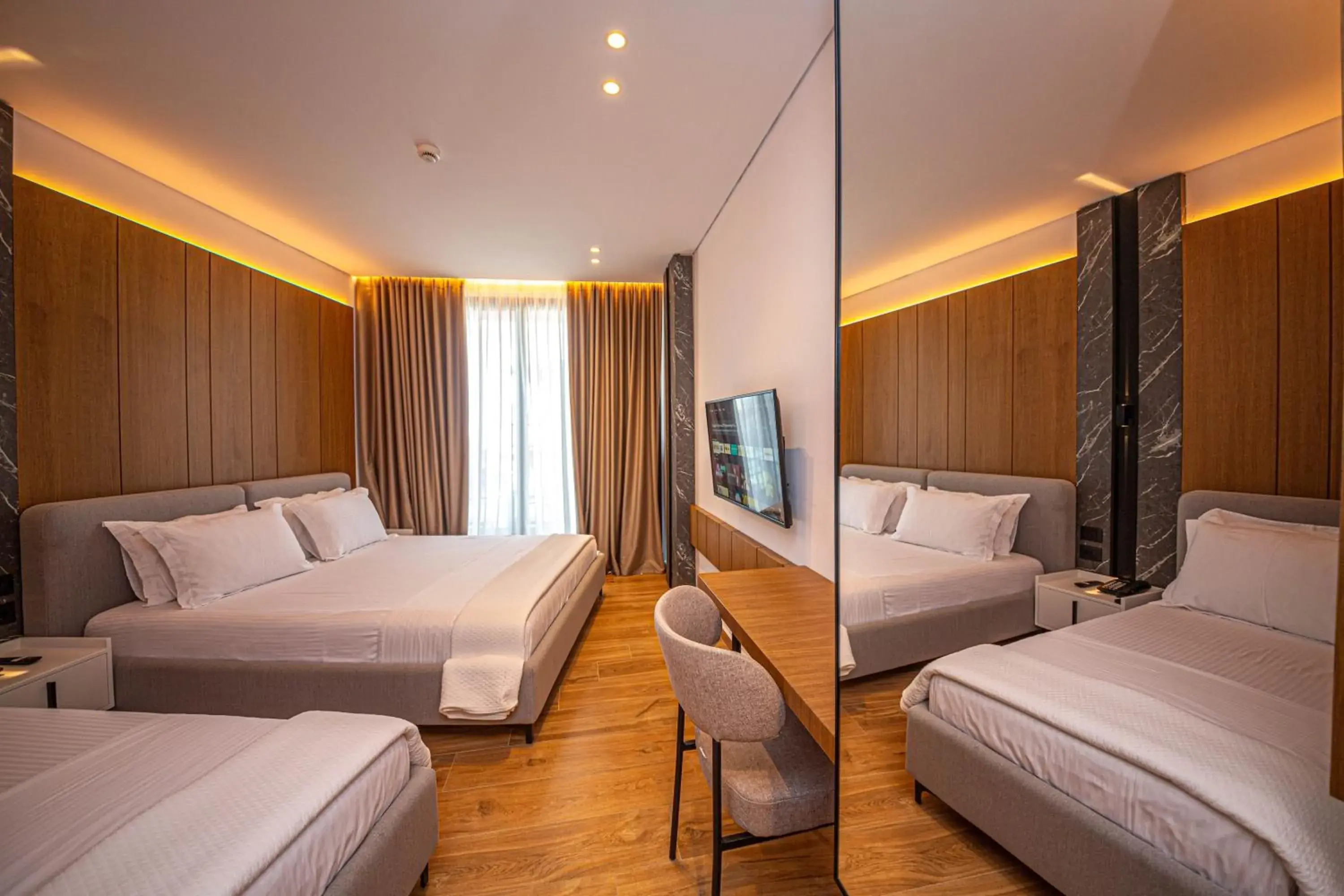 Deluxe Triple Room with Balcony in Nobbu Hotel Ksamil Deluxe Triple Room with Balcony in Nobbu Hotel Ksamil