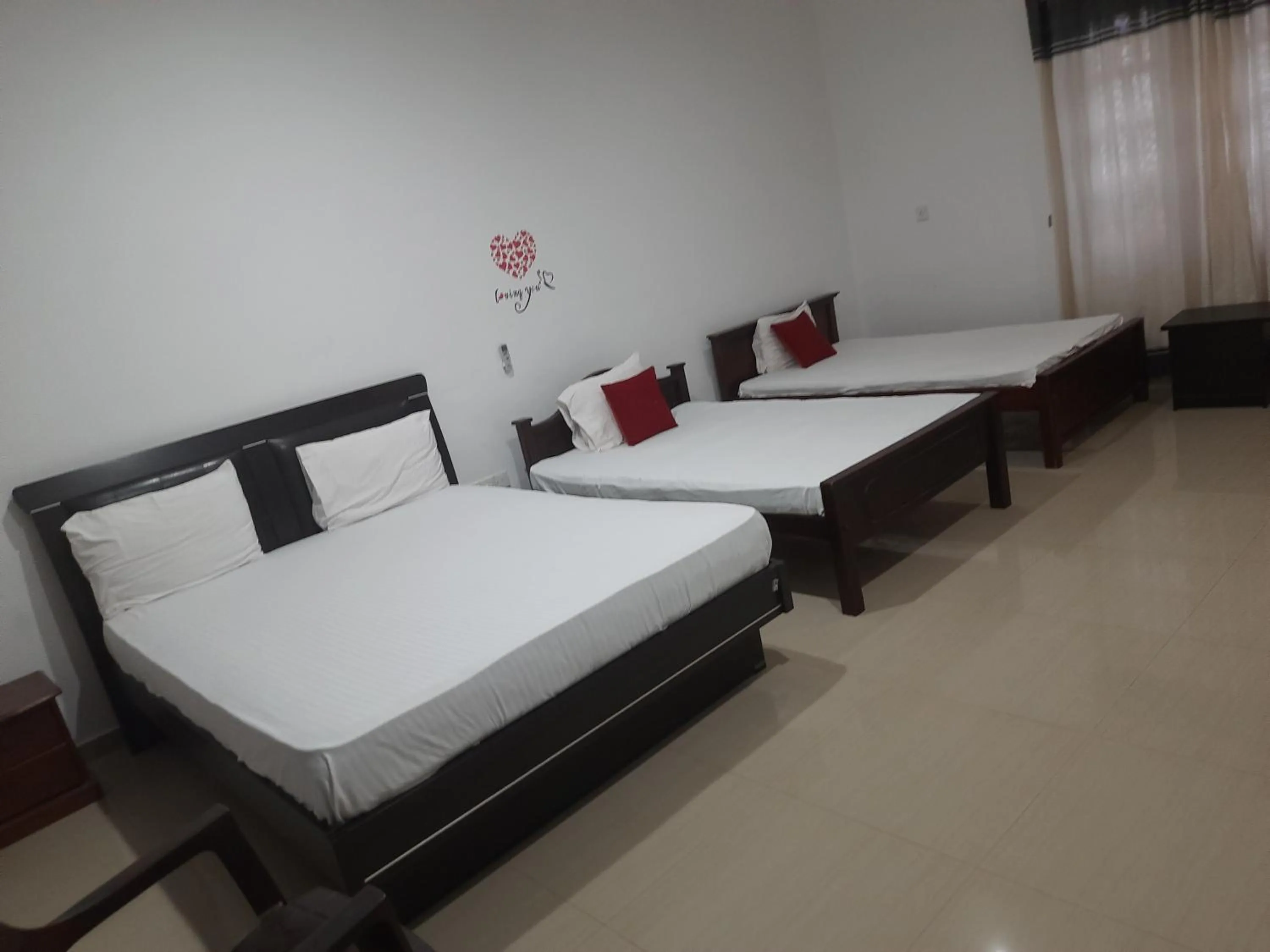 Bed in New Sunrise Hotel