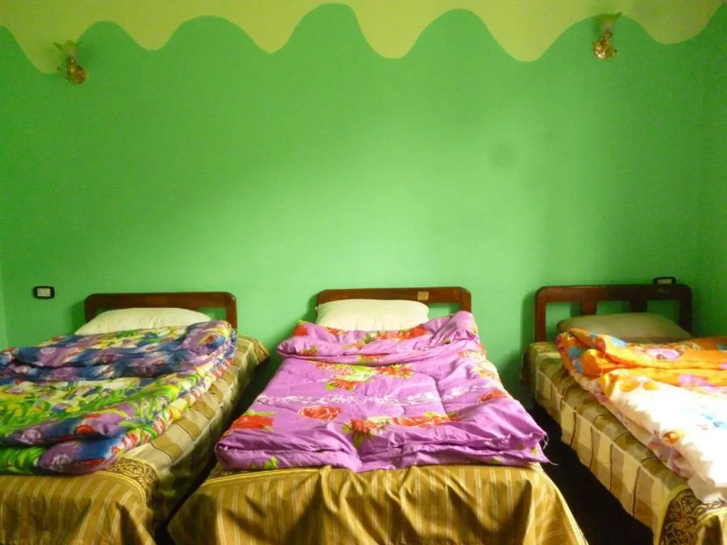 Bed in Safary Hotel