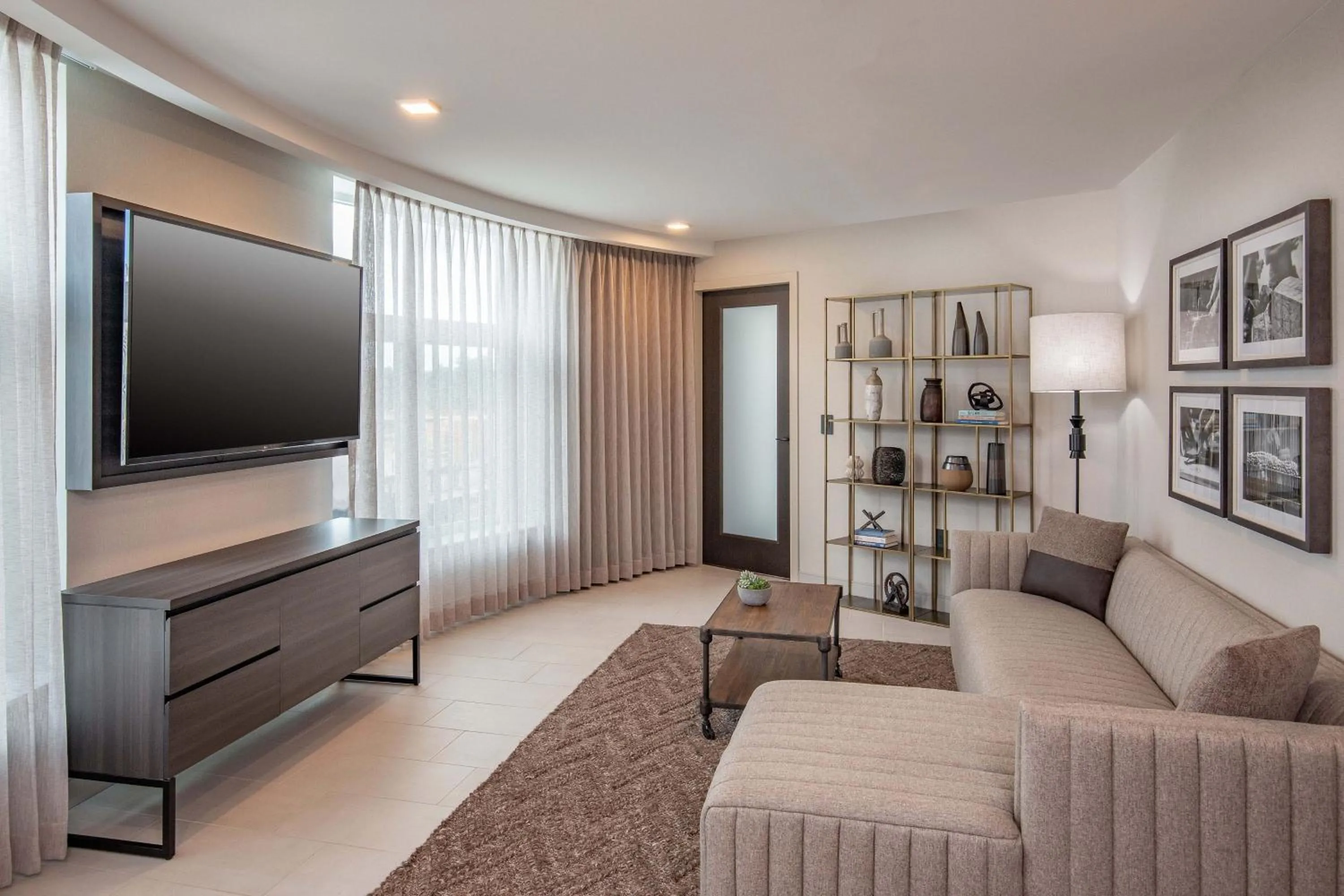 Living room in The Artisan at Tuscan Village, Salem, NH, a Tribute Portfolio Hotel