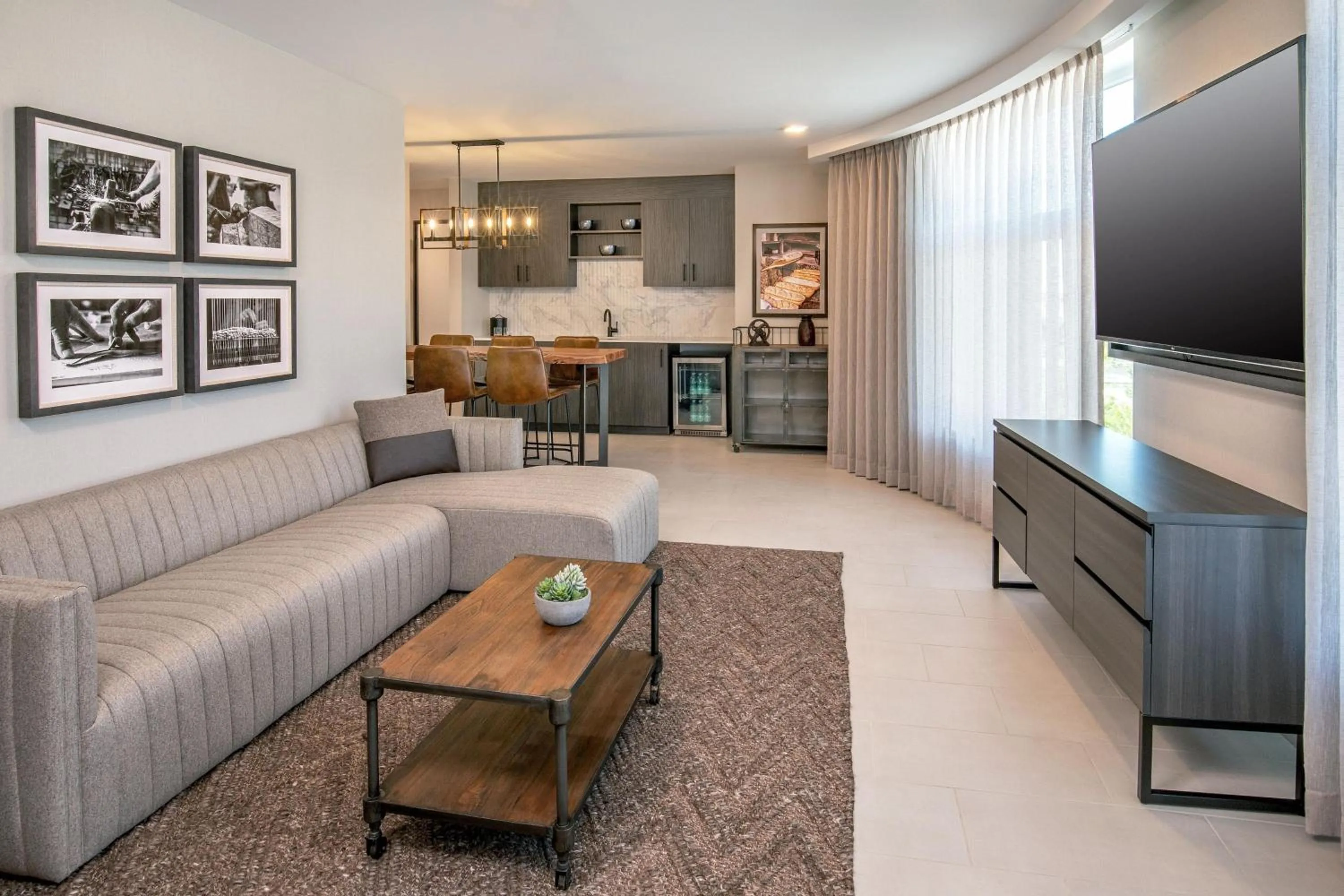 Living room in The Artisan at Tuscan Village, Salem, NH, a Tribute Portfolio Hotel