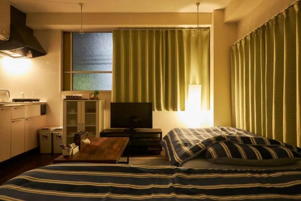 Bed in Oyado Kinokuniya Daikokumachi