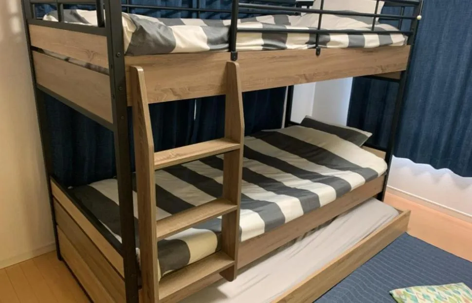 Bed in Oyado Kinokuniya Daikokumachi