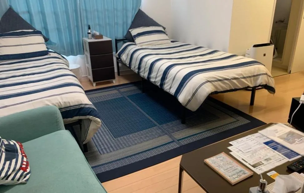 Bed in Oyado Kinokuniya Daikokumachi