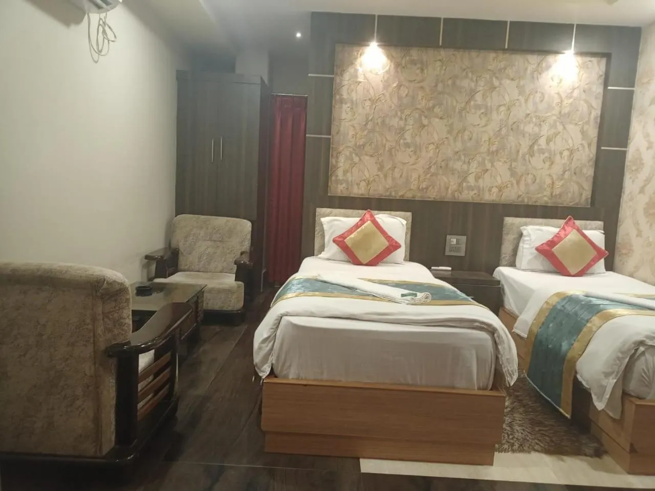 Bed in The Brahmaputra Hotel