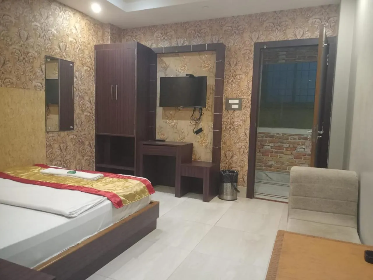 Bed in The Brahmaputra Hotel