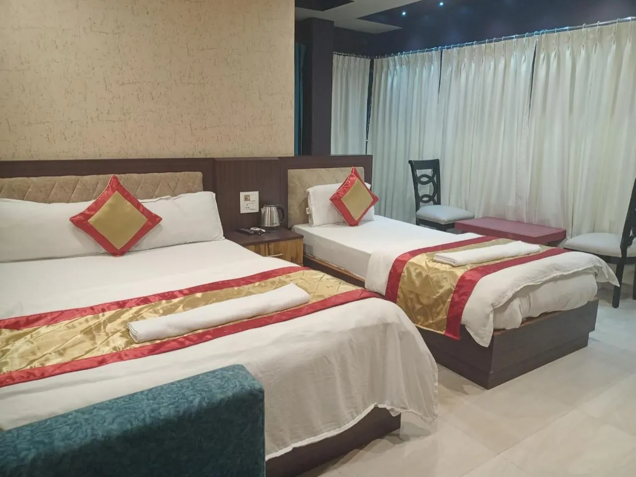 Bed in The Brahmaputra Hotel