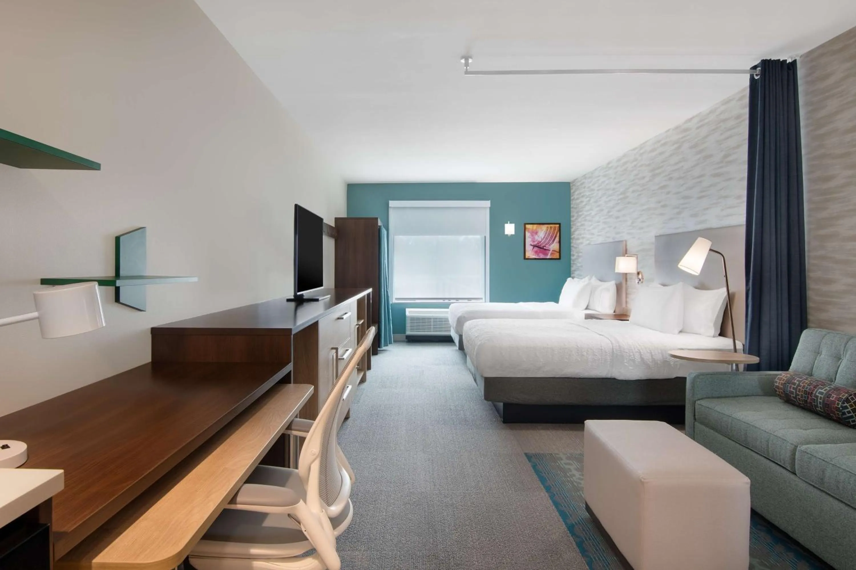 Living room, Bed in Home2 Suites By Hilton Jacksonville Downtown