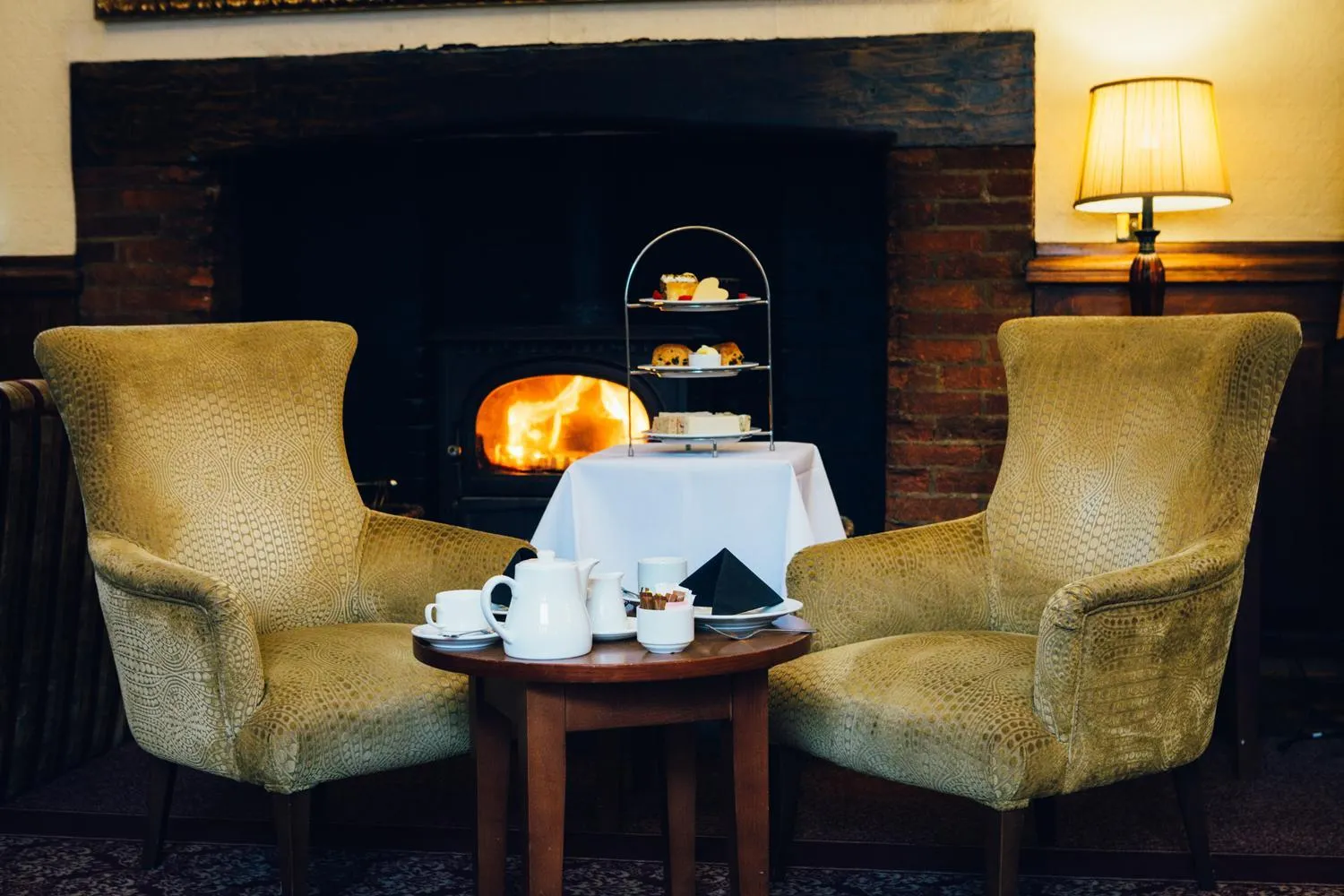 Communal lounge/ TV room in voco Letchworth Hall by IHG