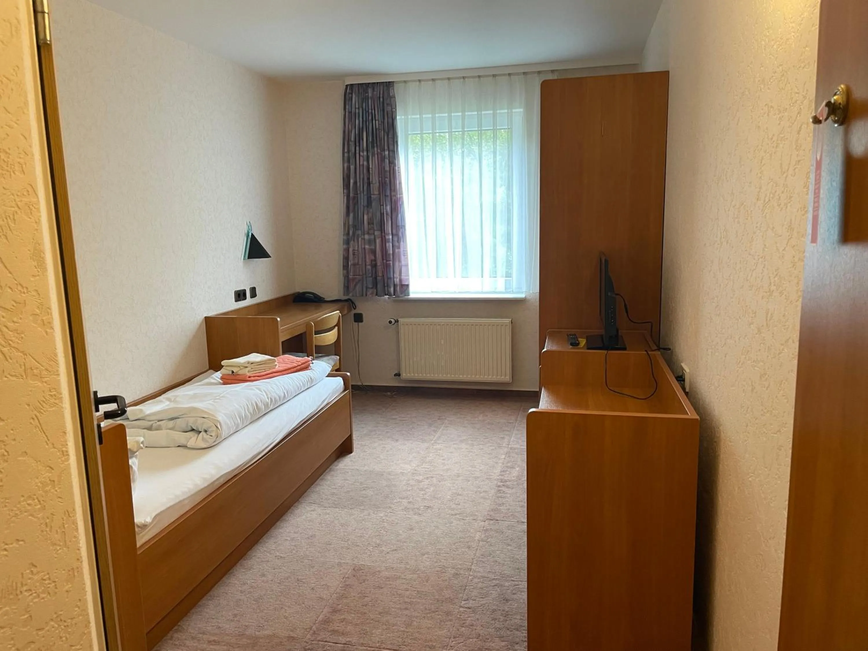 Photo of the whole room in Hotel am Stimbergpark