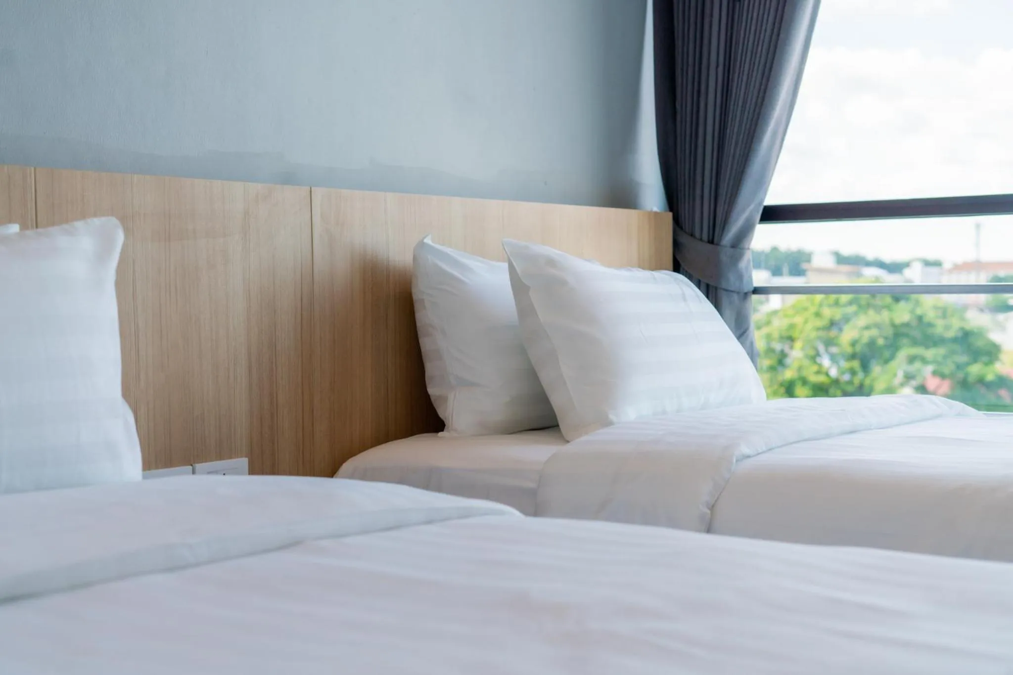 Bed in Goodday Hotel