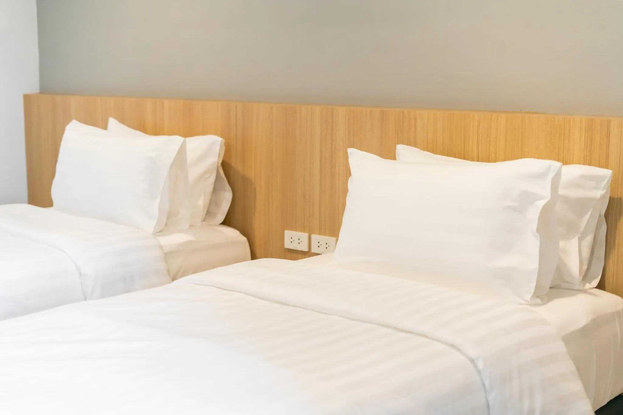 Bed in Goodday Hotel