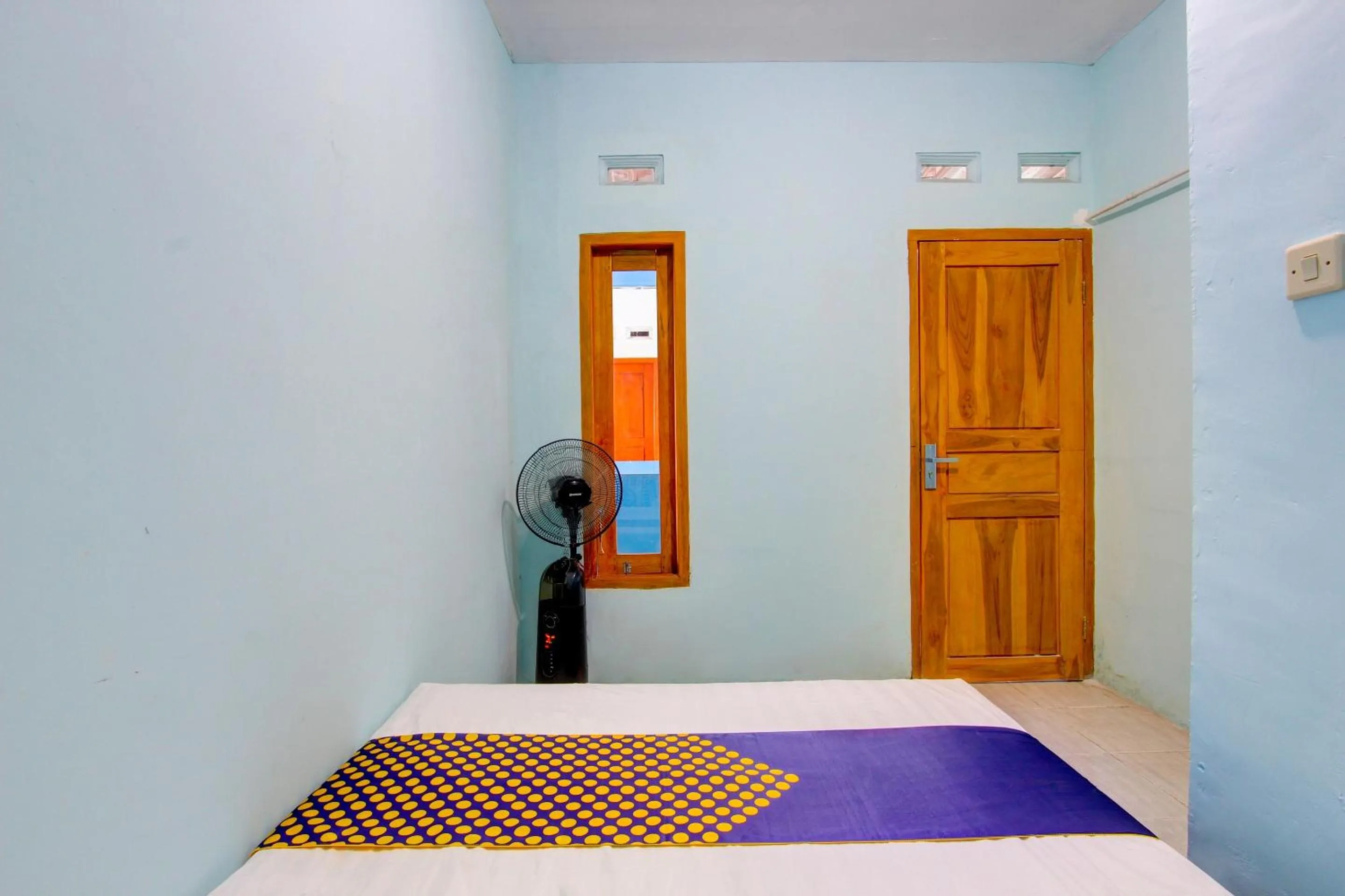 Bedroom in Hotel O Gioba Kost Syariah