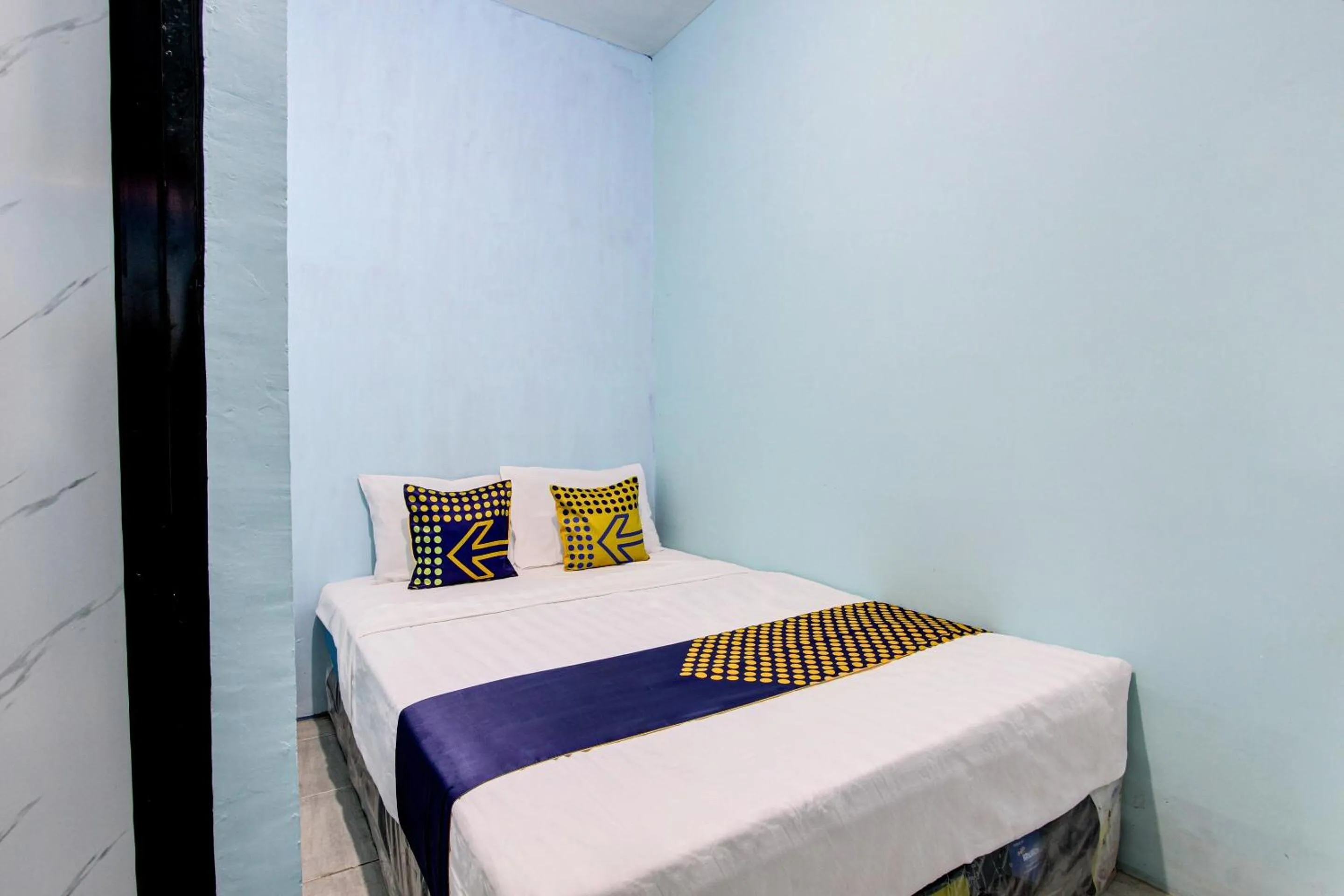 Bedroom in Hotel O Gioba Kost Syariah