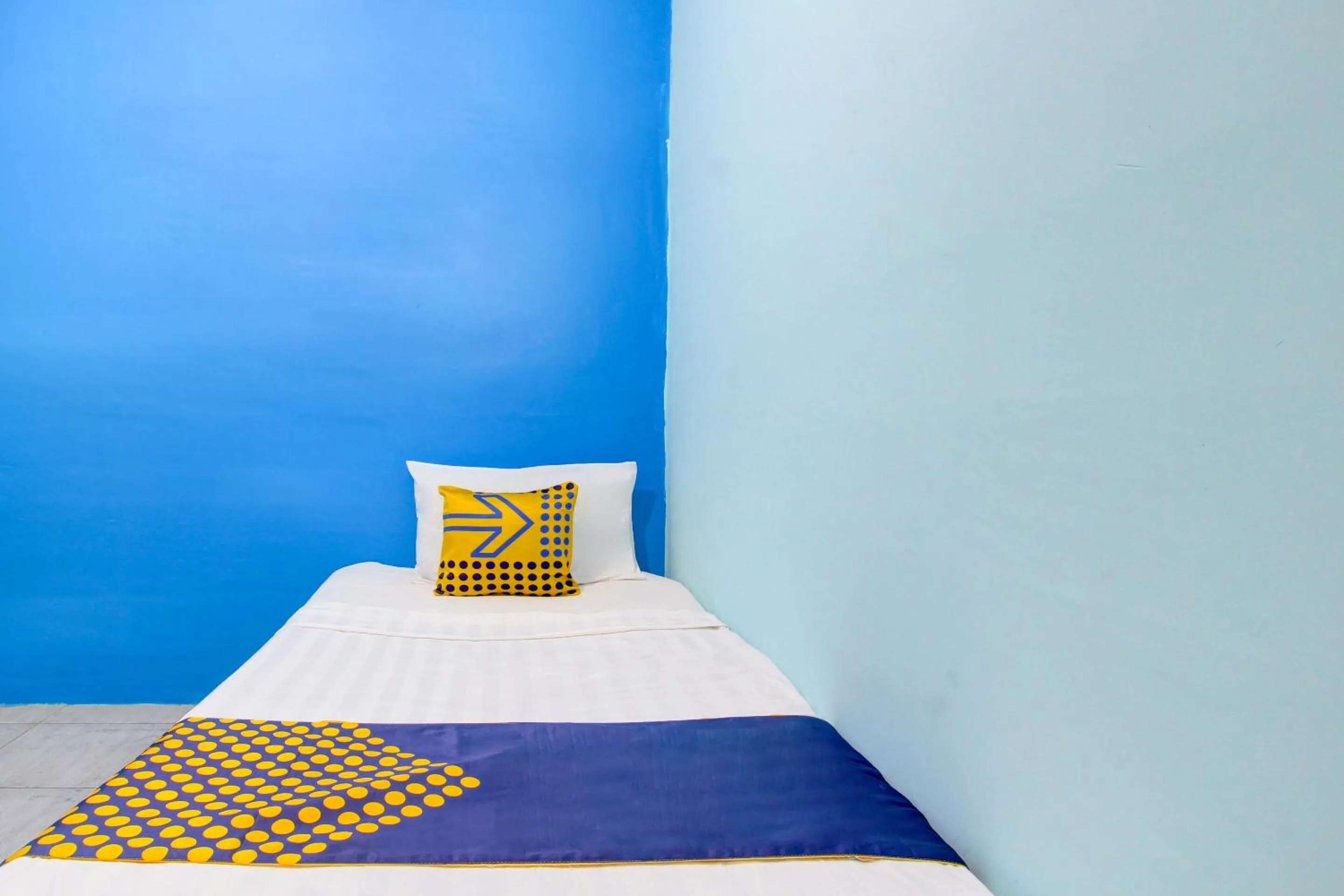 Bedroom in Hotel O Gioba Kost Syariah