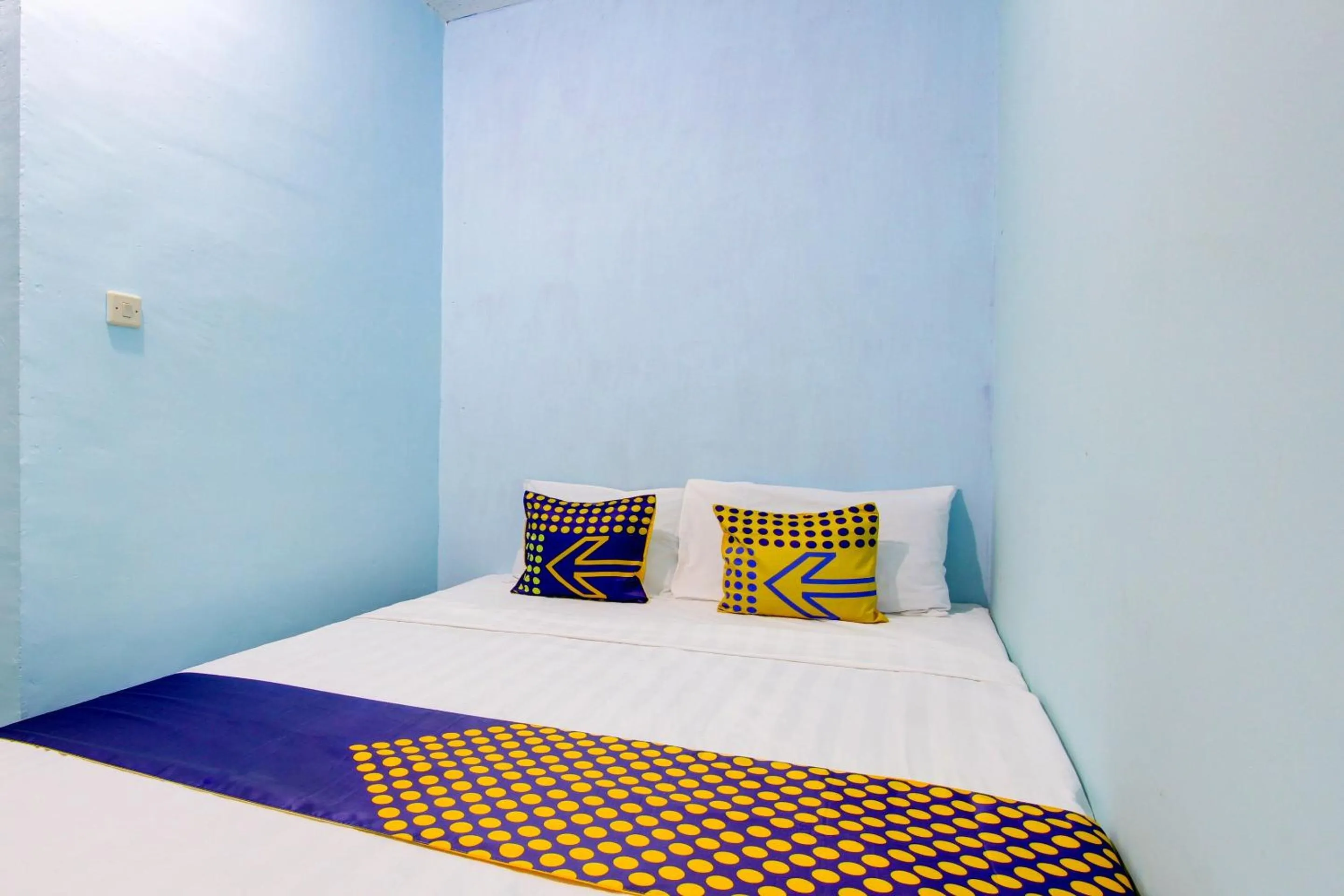 Bedroom in Hotel O Gioba Kost Syariah